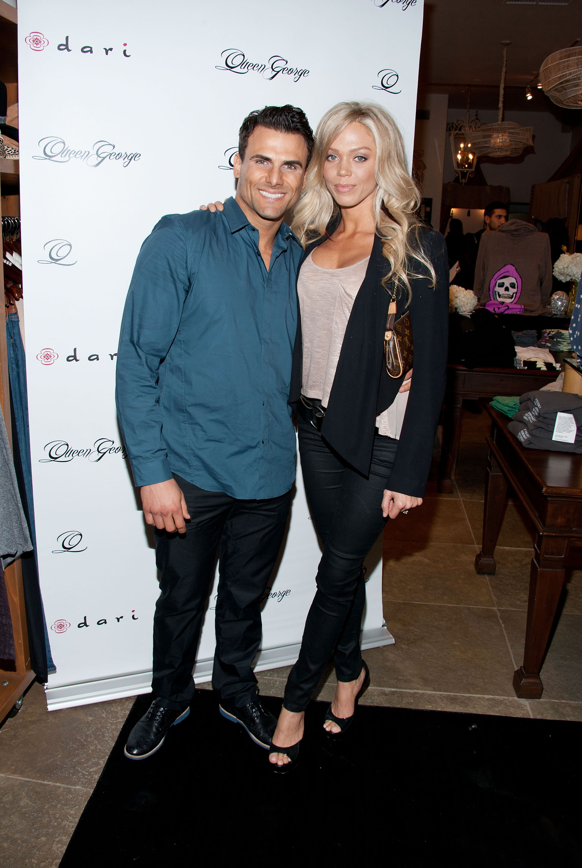 Jeremy Jackson (L) and his fiance Loni Willison arrive at the launch of actress Jodi Lyn O'Keefe's new jewelry collection "Q" at Dari Boutique in Studio City, California on January 23, 2012. | Source: Getty Images