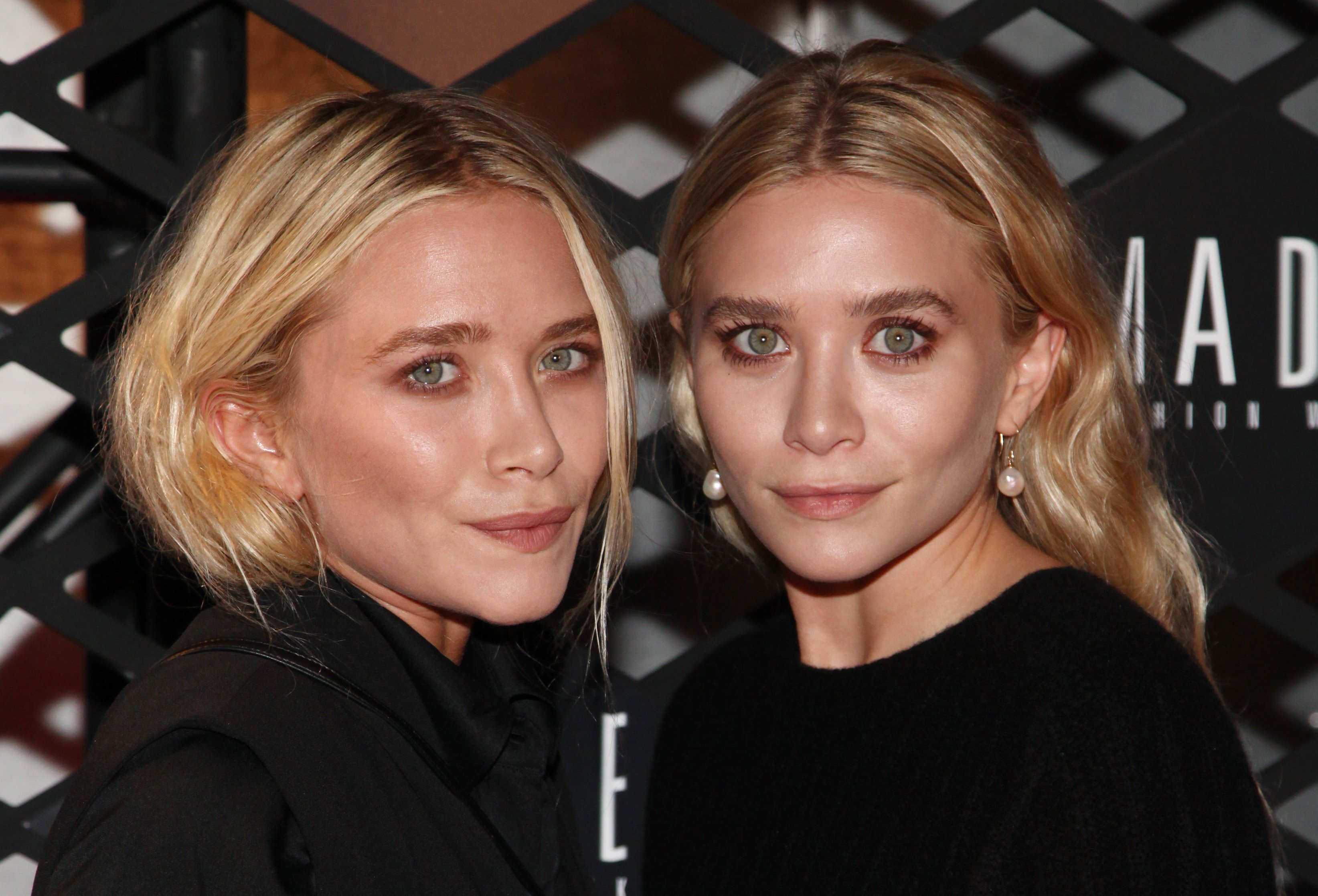 The twins attend the Lexus Design Disrupted Fashion Event at SIR Stage 37 on September 5, 2013 in New York City | Source: Getty Images