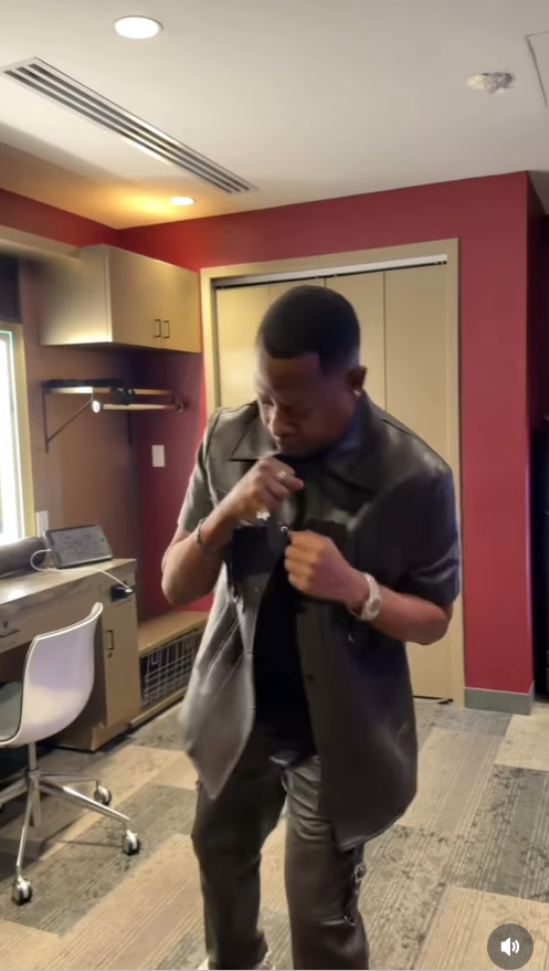 In the first frame, Martin Lawrence appears in a dressing room, seen through a large, illuminated mirror as he begins to move, his reflection capturing the start of a playful dance. | Source: Instagram/martinlawrence