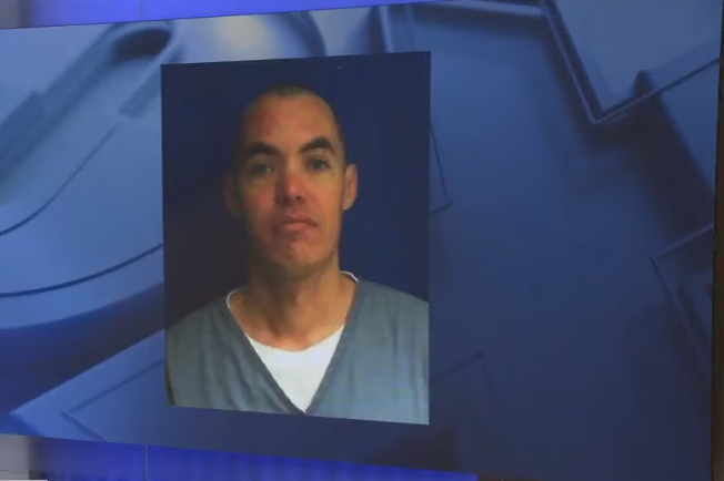 Michael Smith's mugshot, from a news report dated January 21, 2026 | Source: YouTube/FOX 35 Orlando