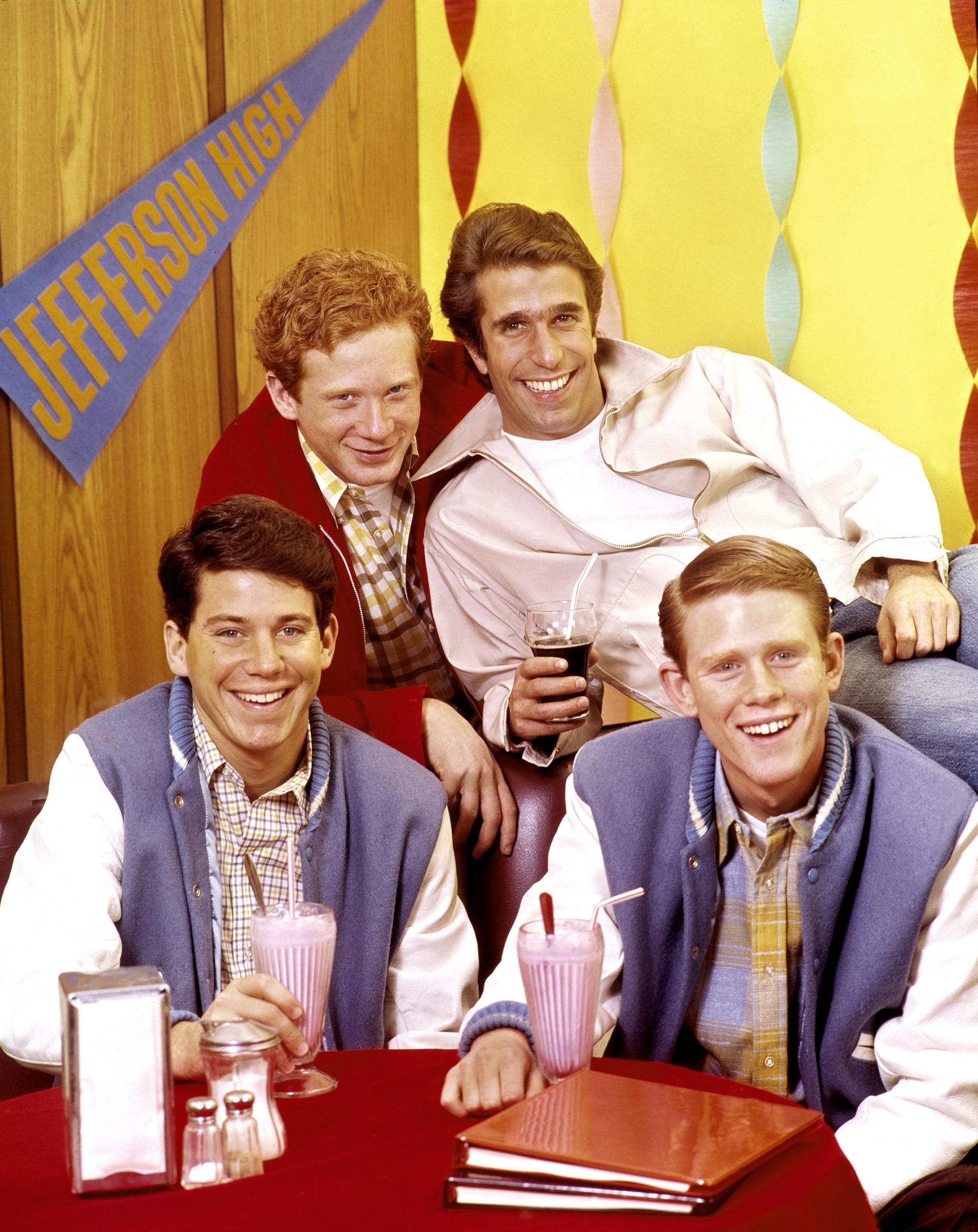 The actor is pictured with his Happy Days co-stars Ron Howard, Donny Most and Henry Winkler in a scene from the beloved sitcom. | Source: Getty Images