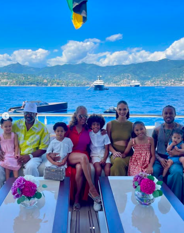 Steve and Marjorie Harvey posing for a photo with their loved ones, posted on July 14, 2024. | Source: Instagram/marjorie_harvey