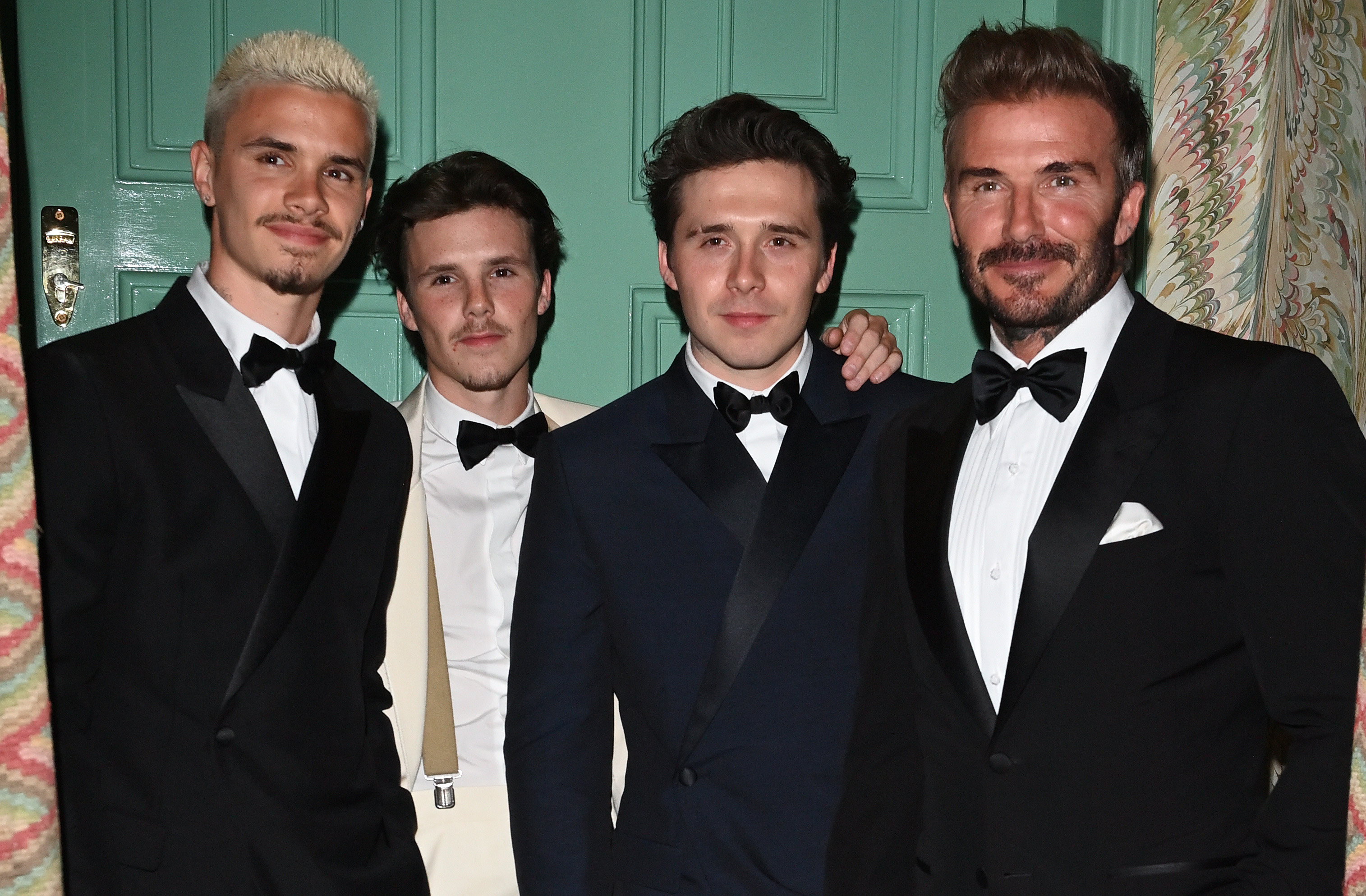 David, Brooklyn, Romeo, and Cruz Beckham are at Victoria Beckham's 50th Birthday Party held at Oswald's, Mayfair, London on April 20, 2024 | Source: Getty Images