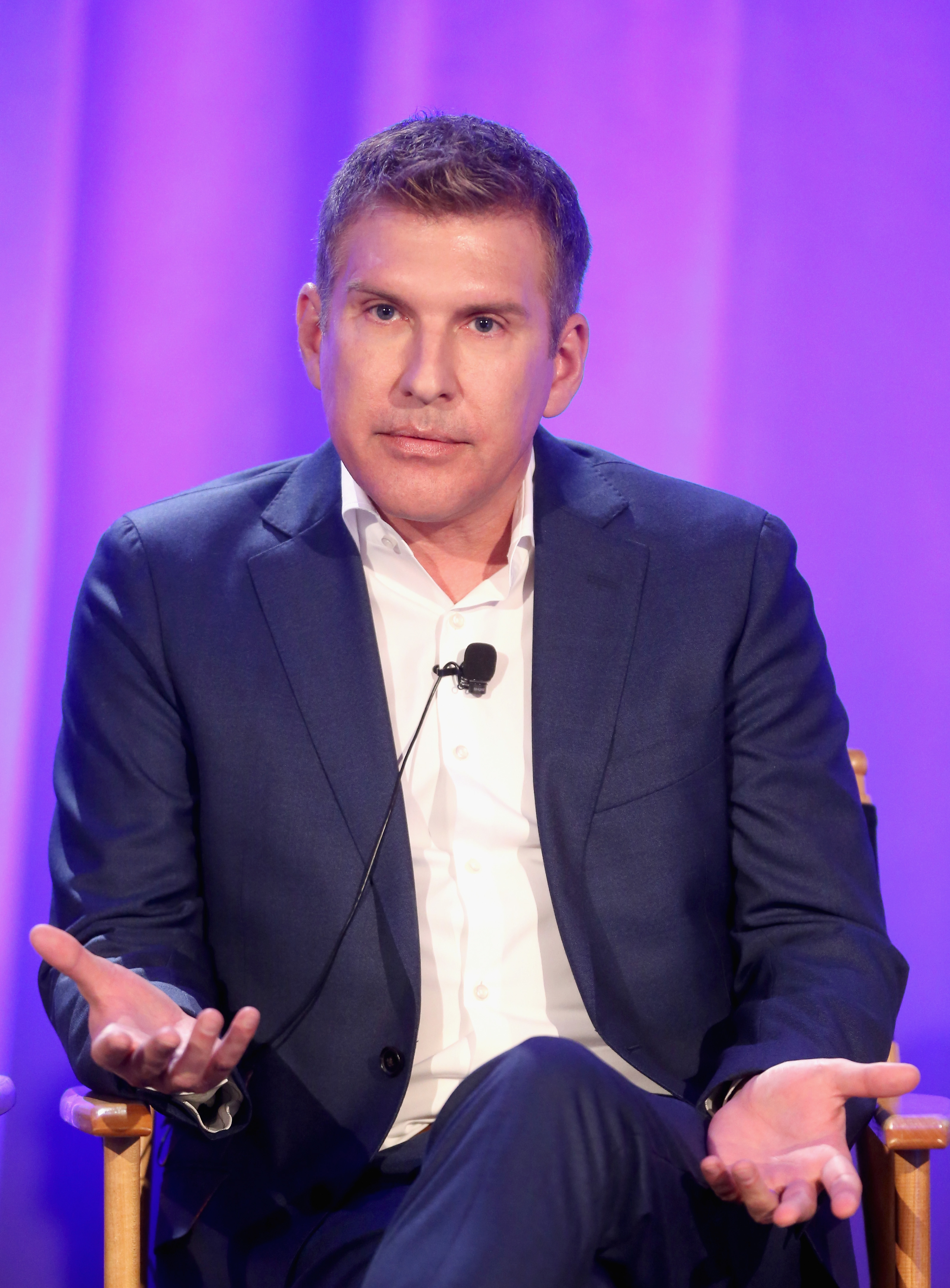 Todd Chrisley speaks at an NBCUniversal event in California in April 2016. The reality TV star has an unexpected connection to his daughter's fiancé, Jason Galanis. | Source: Getty Images
