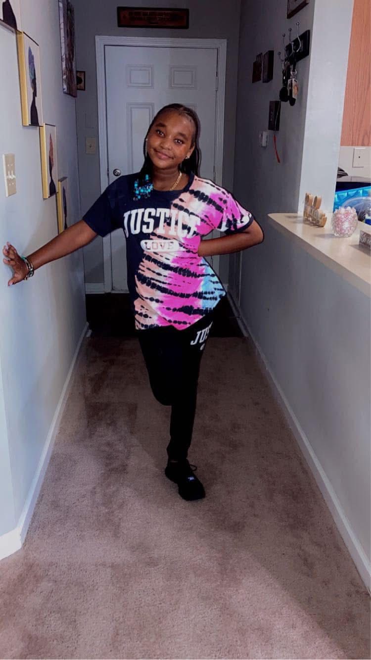 Jada West posing for the camera in a corridor. | Source: Facebook/McClendon Rashunda