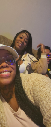 Brittany Members smiling for a photo with loved ones. | Source: GoFundMe/Honoring Brittany Members' Memory