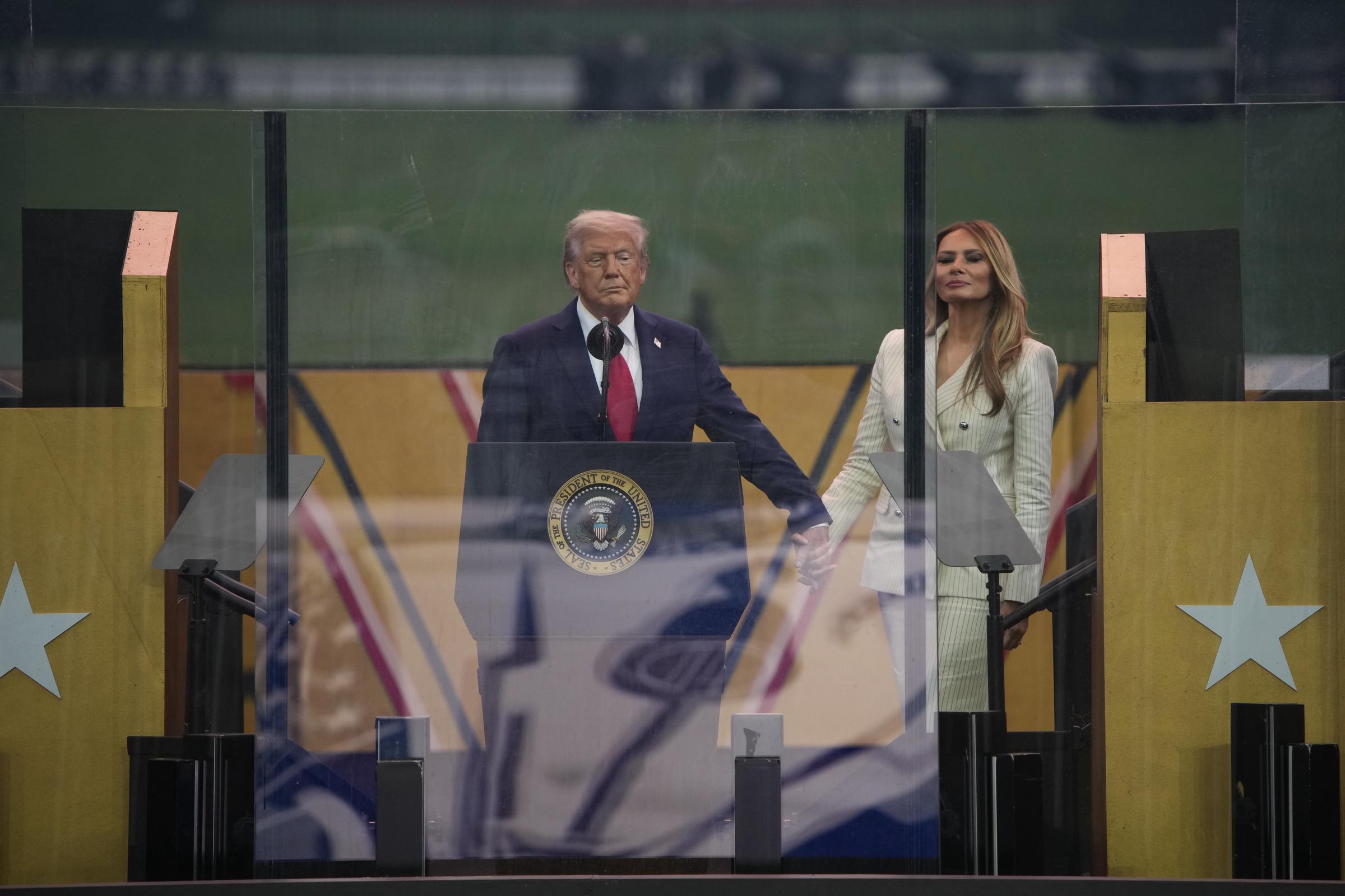 President Donald Trump and First Lady Melania stand together at the end of the U.S Army parade on June 14, 2025 | Source: Getty Images
