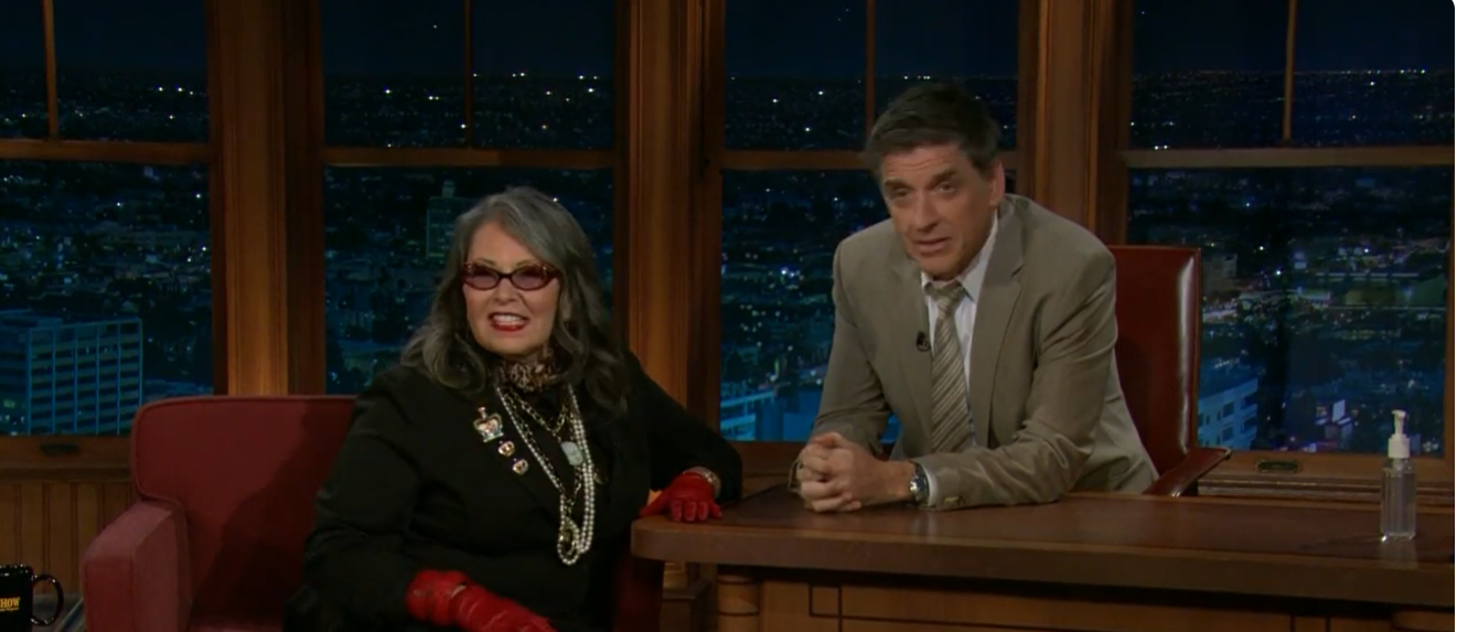 Roseanne Barr appeared alongside Craig Ferguson on The Late Late Show with Craig Ferguson in January 2011, where she discussed Dolly Parton's tattoos and described them as pastel-colored designs featuring bows rather than traditional dark ink. Barr's comments added to the long-running curiosity surrounding the body art Parton had largely kept out of public view. | Source: YouTube/ Late Late Show w/ Craig Ferguson Archive