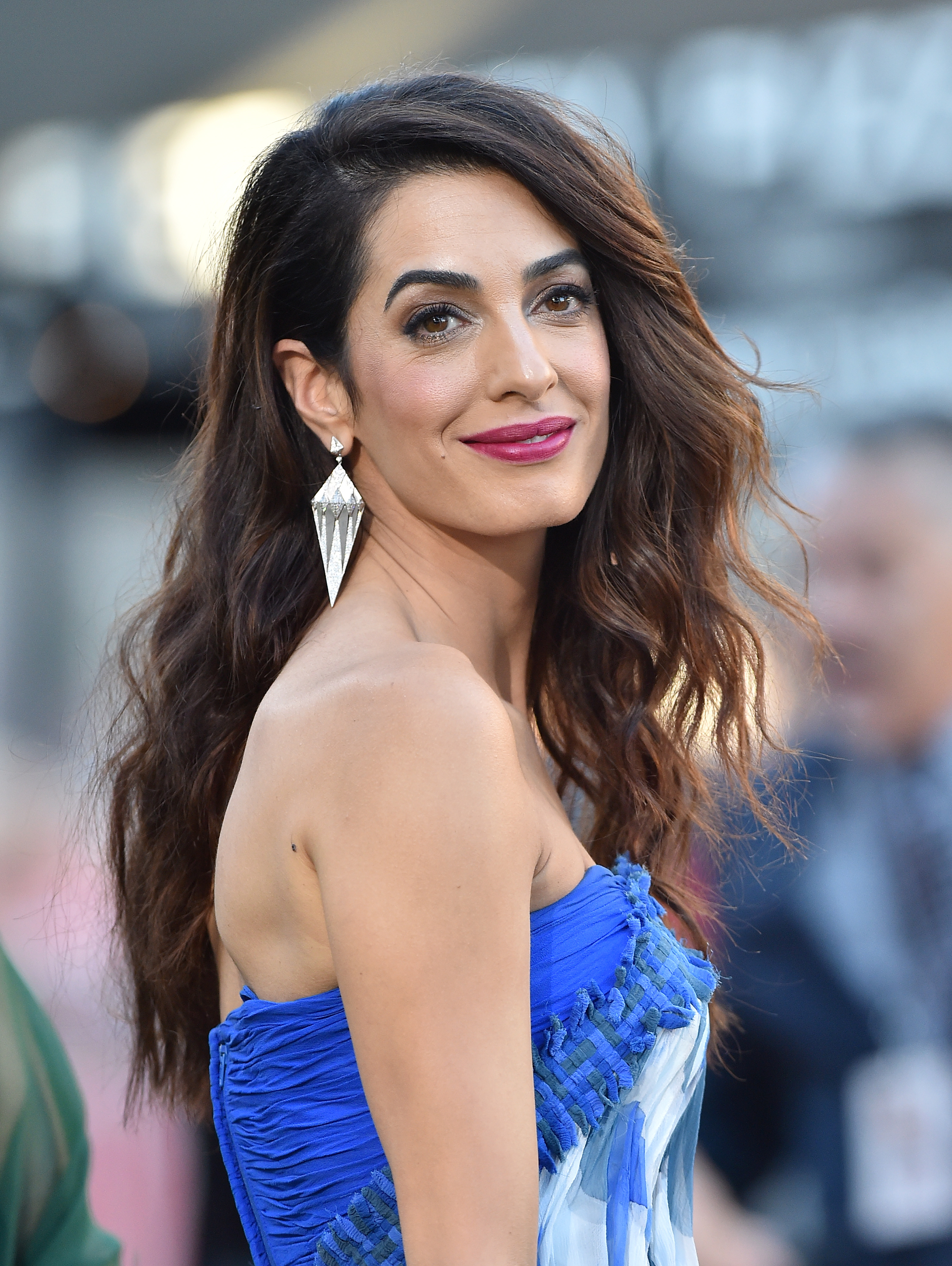 Amal Clooney attends the premiere of Paramount Pictures’ Suburbicon at the Regency Village Theatre in Westwood, California, on October 22, 2017. By then, she and George had welcomed twins, balancing parenthood with high-profile careers.