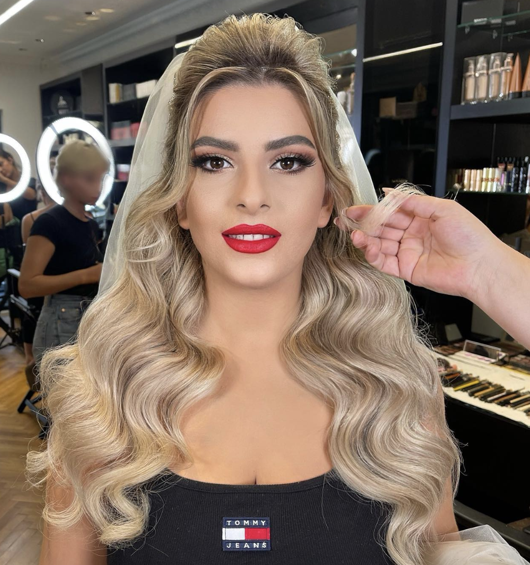 The bride after getting glam makeup | Source: Instagram/arber_bytyqi_mua