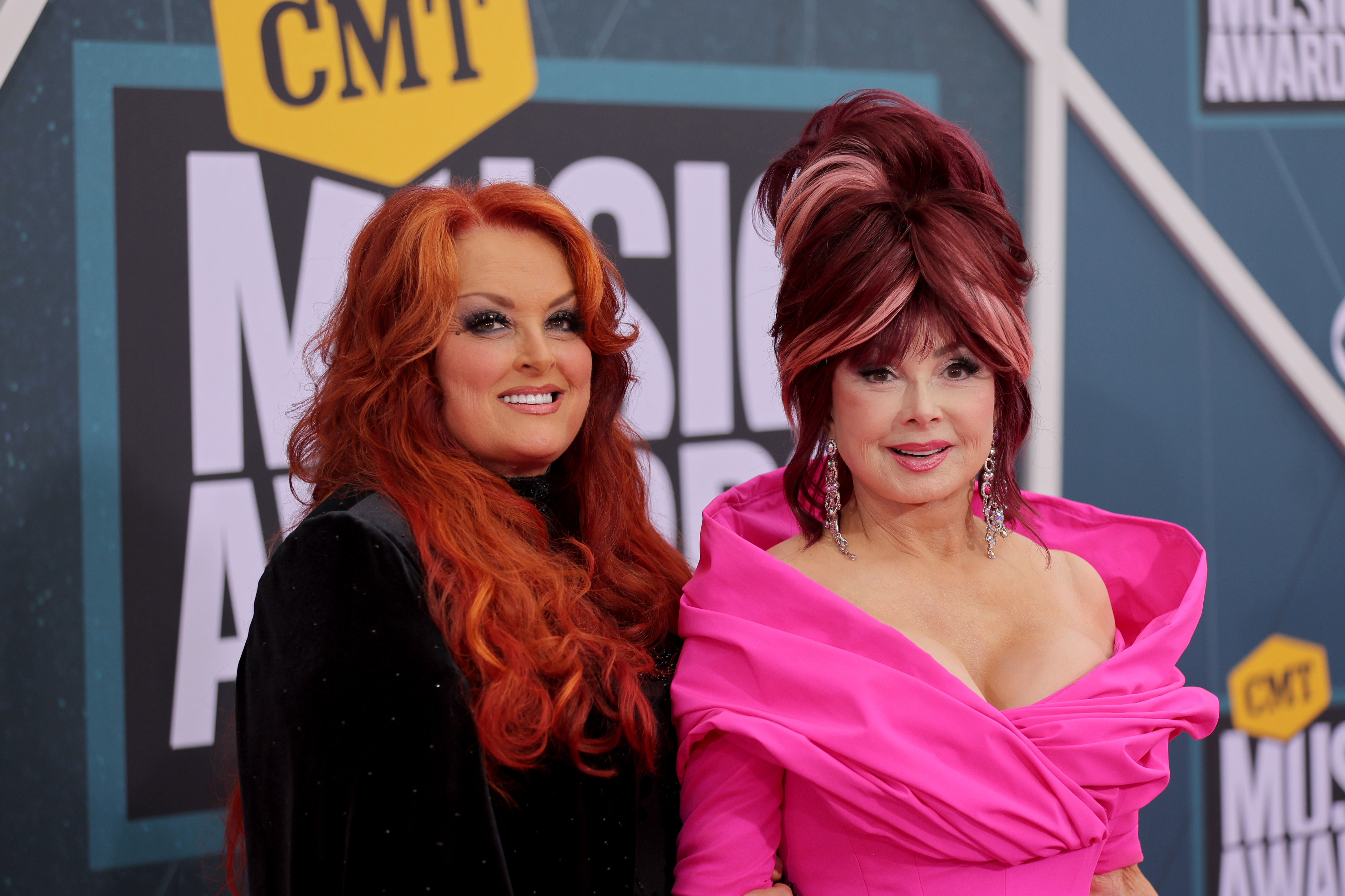 Wynonna and Naomi Judd pose together at the CMT Music Awards in Nashville on April 11, 2022. Naomi died less than three weeks after their appearance. | Source: Getty Images