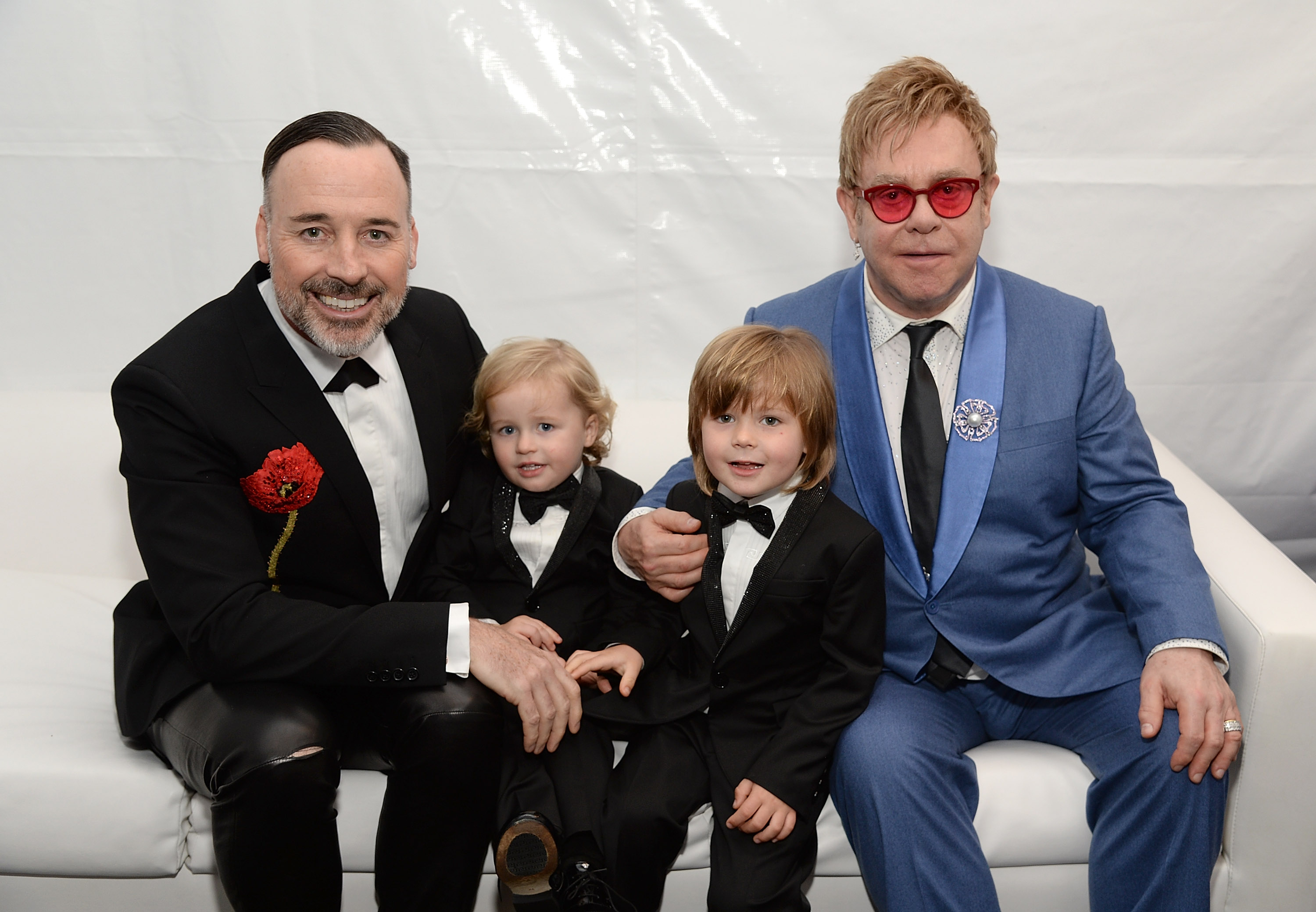David Furnish and Elton John with their sons, Elijah and Zachary Furnish-John, at the 23rd Annual Elton John AIDS Foundation Academy Awards Viewing Party on February 22, 2015, in Los Angeles, California. | Source: Getty Images