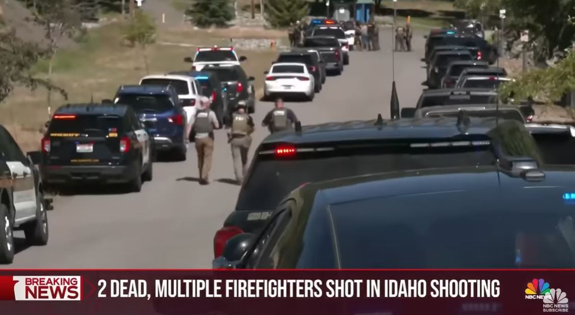 Police and tactical units arrive near the Canfield Mountain trailhead following reports of an ambush on firefighters, posted on June 29, 2025 | Source: YouTube/NBCNews