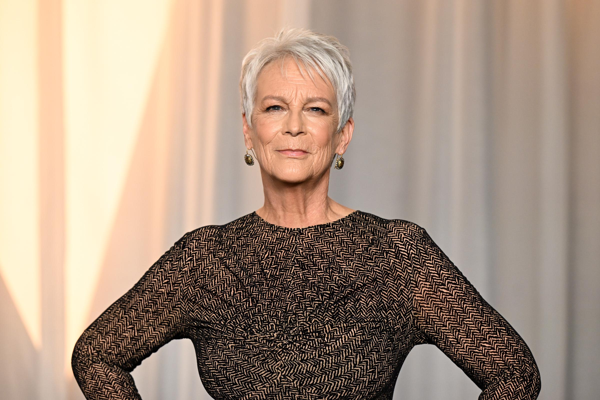 Jamie Lee Curtis shows off her signature short silver hair at the 6th Annual Academy Museum Gala in Los Angeles on October 17, 2026. The actress has embraced her natural gray hair for more than two decades.