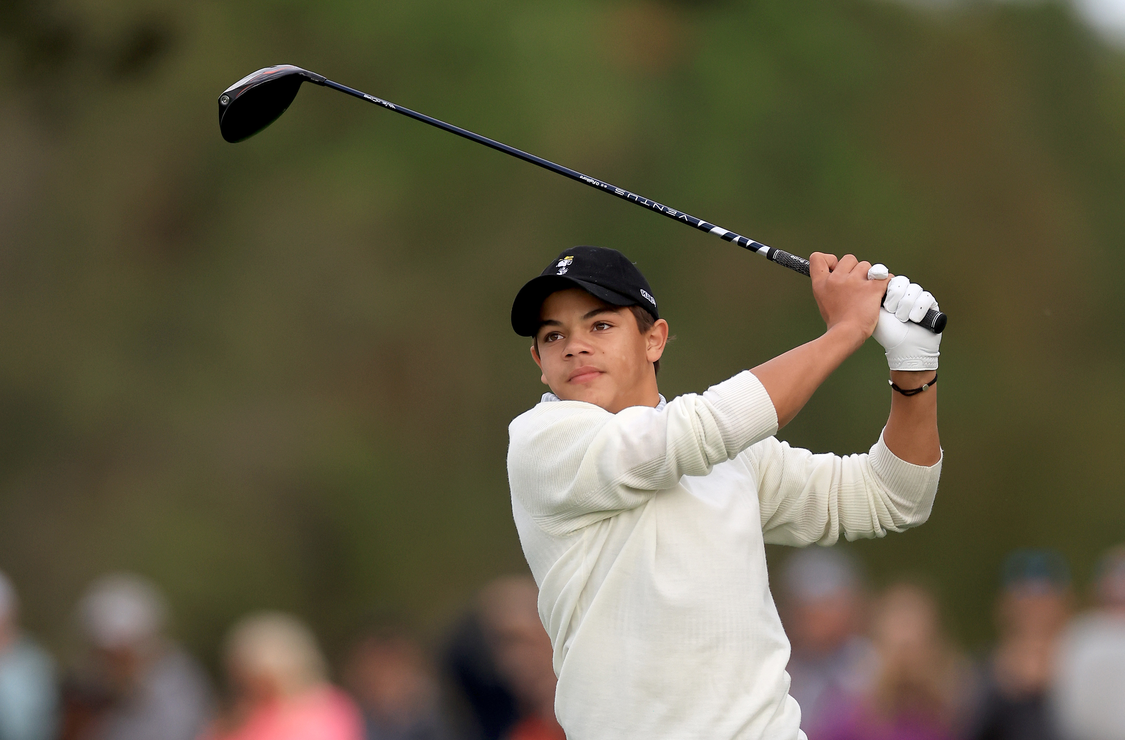Charlie Woods plays a tee shot on the second hole during the Friday pro-am as a preview for the PNC Championship at The Ritz-Carlton Golf Club on December 16, 2022, in Orlando, Florida | Source: Getty Images