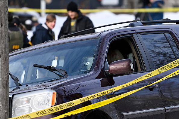 Police tape surrounds a vehicle suspected to be involved in a shooting by an ICE agent during federal law enforcement operations on January 7, 2026, in Minneapolis, Minnesota | Source: Getty Images