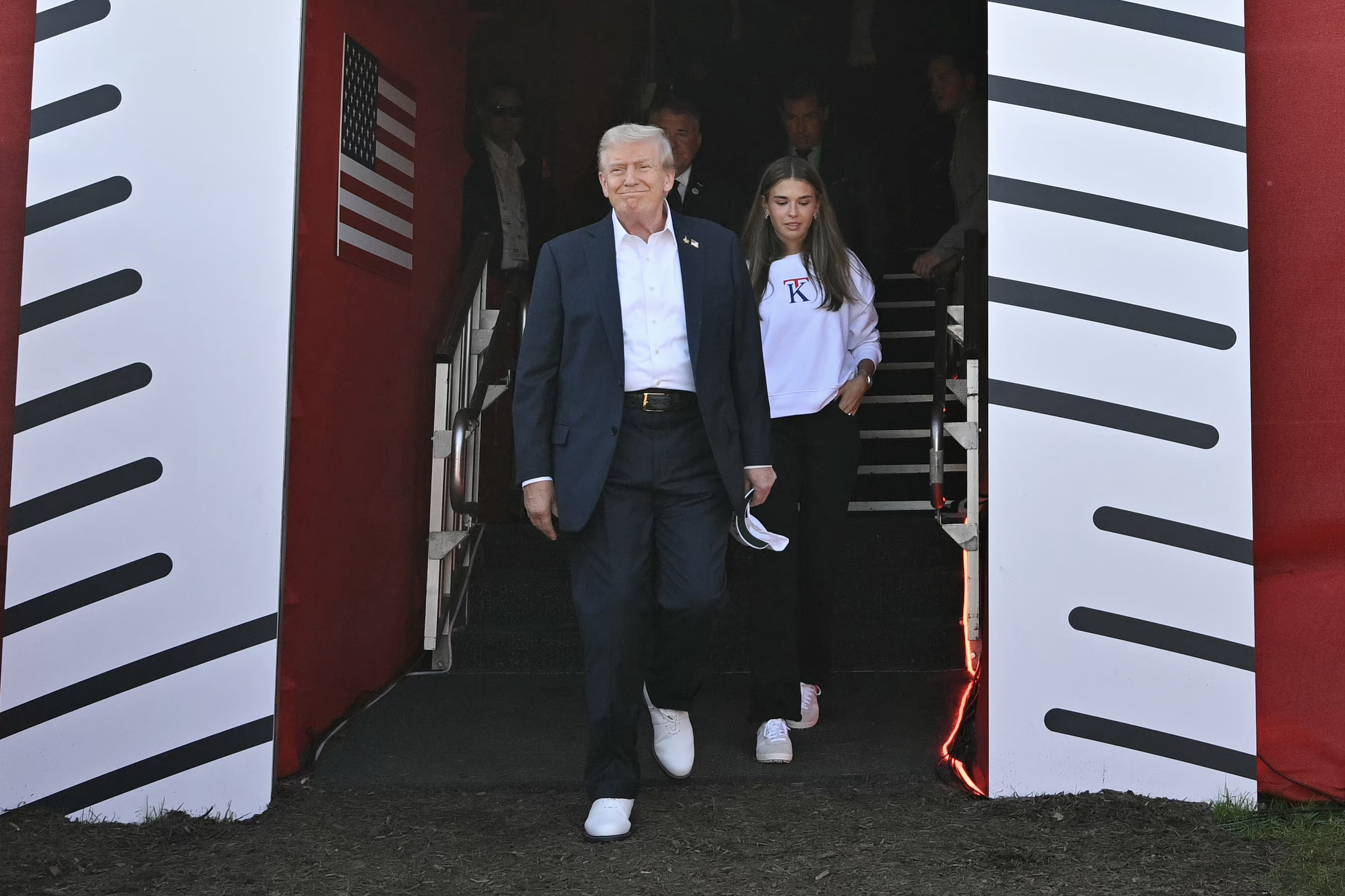 Donald Trump with his granddaughter Kai, attends the Ryder Cup at Black Course on September 26, 2025 | Source: Getty Images
