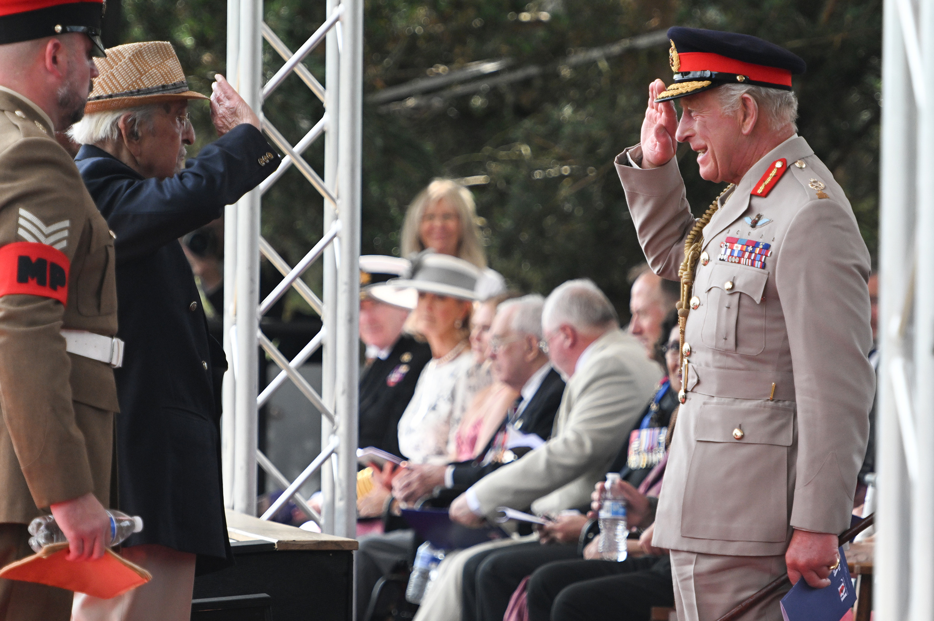 King Charles III and Yavar Abbas during a Service of Remembrance to commemorate the 80th Anniversary of VJ Day at The National Memorial Arboretum on August 15, 2025, in Alrewas, Staffordshire | Source: Getty Images