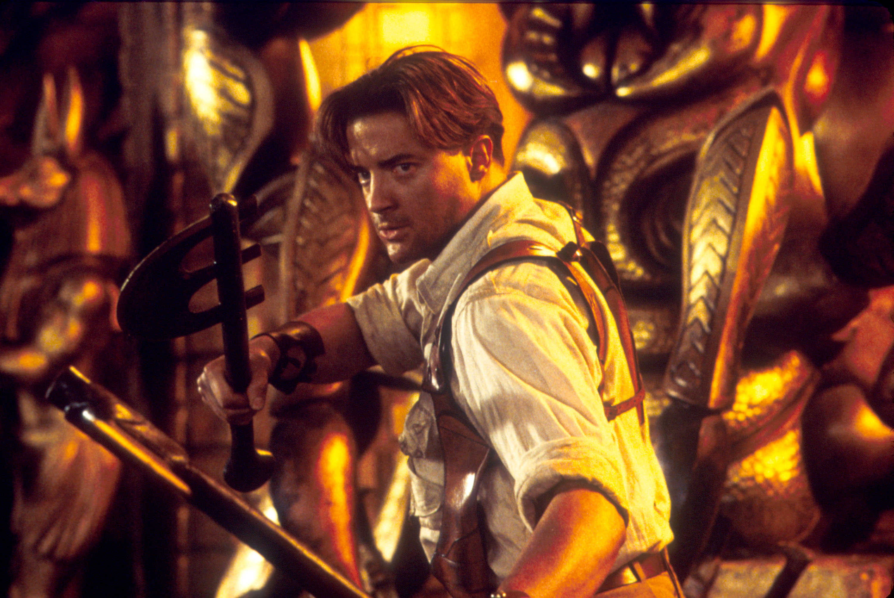 Brendan Fraser as Rick O'Connell in "The Mummy Returns" (2001), during which he suffered a broken rib, a knee injury, and a damaged spinal disc while performing physically demanding action scenes. | Source: Getty Images
