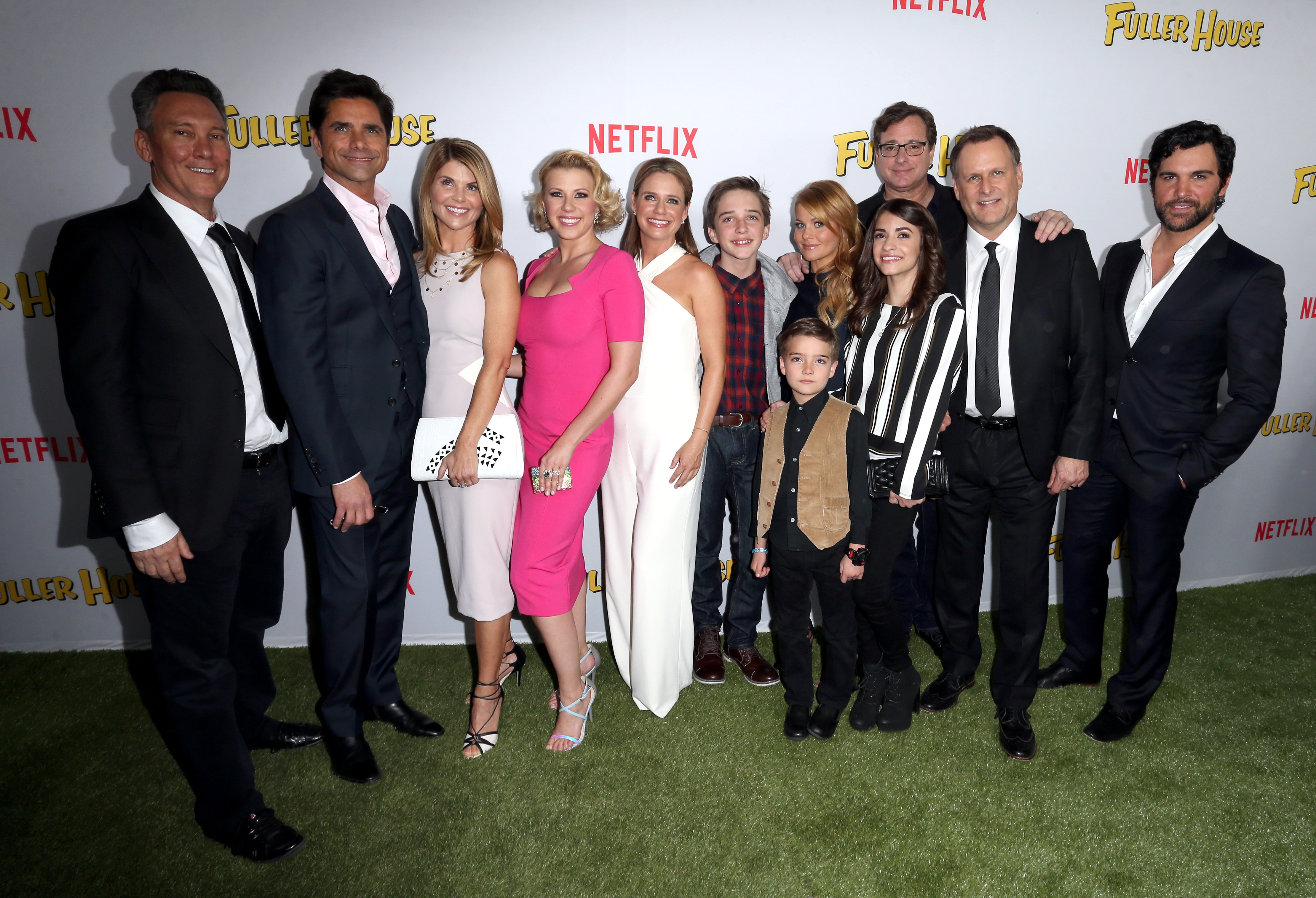 John Stamos, Lori Loughlin, Jodie Sweetin, and Candace Cameron Bure celebrate alongside creator Jeff Franklin, Bob Saget, Dave Coulier, and the revival cast at the Los Angeles premiere of "Fuller House" on February 16, 2016. Returning to their iconic roles more than two decades after the original sitcom concluded, the four stars reunited to carry the beloved Tanner family legacy forward to a new generation of fans.