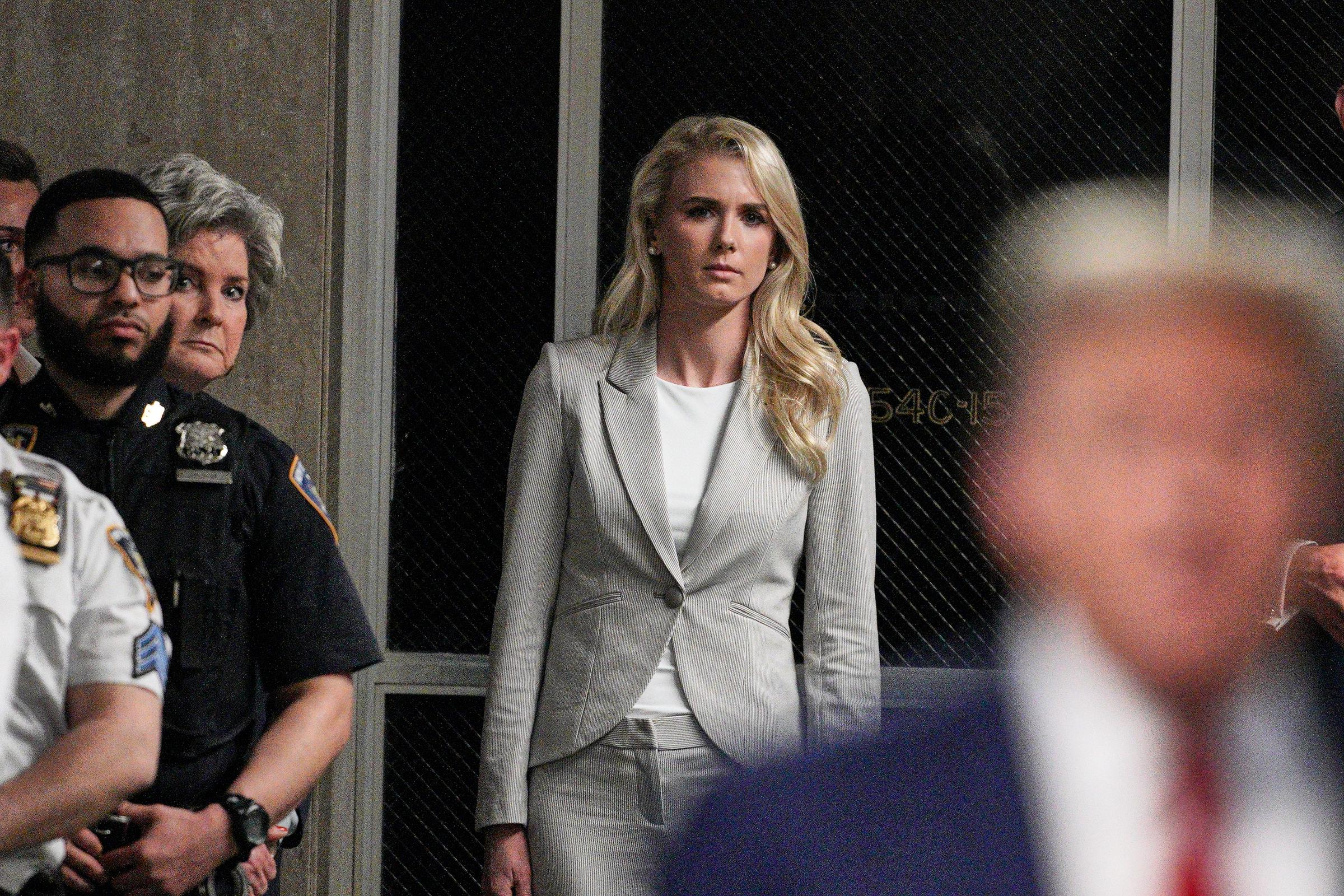 Natalie Harp has been described in recent reporting as one of Donald Trump's most devoted aides, with access that went far beyond ordinary staff duties. New books and reports claim her influence came through quiet proximity, filtered information, and intensely personal loyalty. | Source: Getty Images