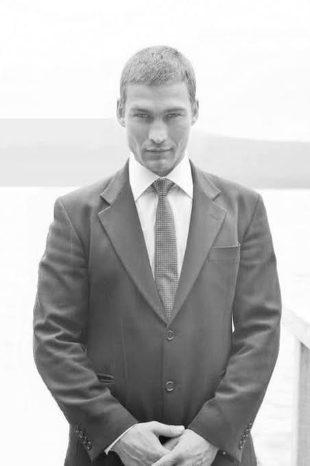 A black-and-white portrait captures a young actor in a formal suit, long before Patrick Stewart's worldwide success with Star Trek. Stewart later admitted that his devotion to acting came at a painful personal cost, as he often prioritized his career over time with his children. | Source: CelebStory