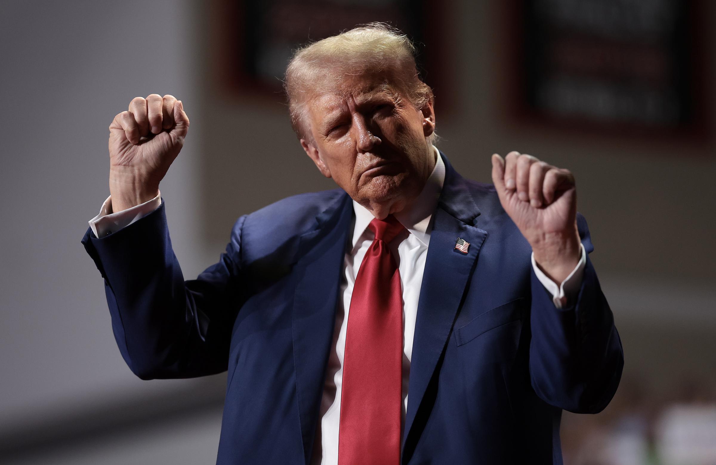 U.S. President Donald Trump dances on stage as he finishes speaking at a campaign rally at the Ed Fry Arena on September 23, 2024, in Indiana, Pennsylvania | Source: Getty Images