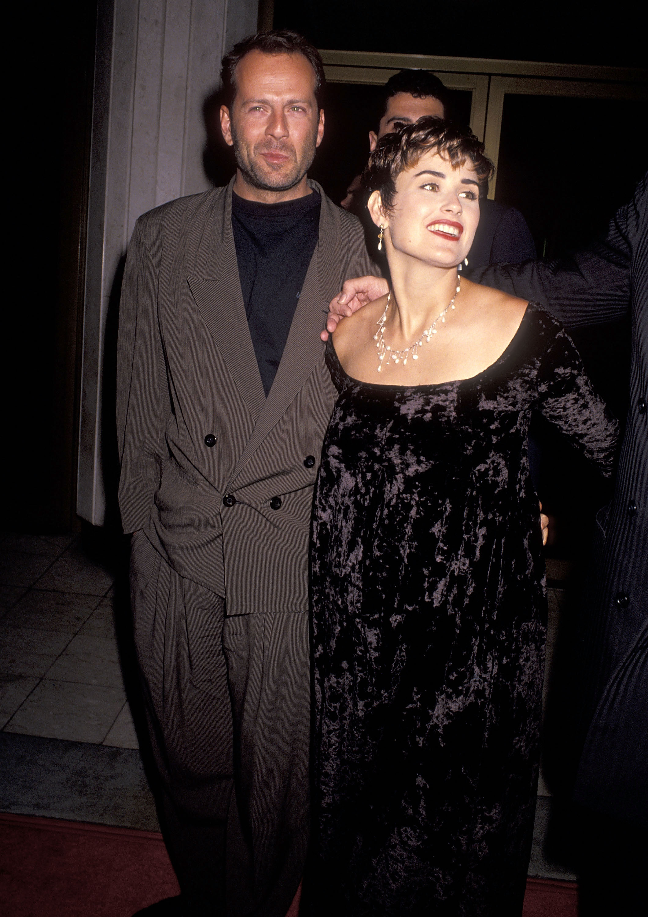 Years after this photograph, Bruce welcomed two more daughters, Mabel and Evelyn, with Emma Heming Willis, creating a blended family that would eventually bring his former and current wives together. | Source: Getty Images