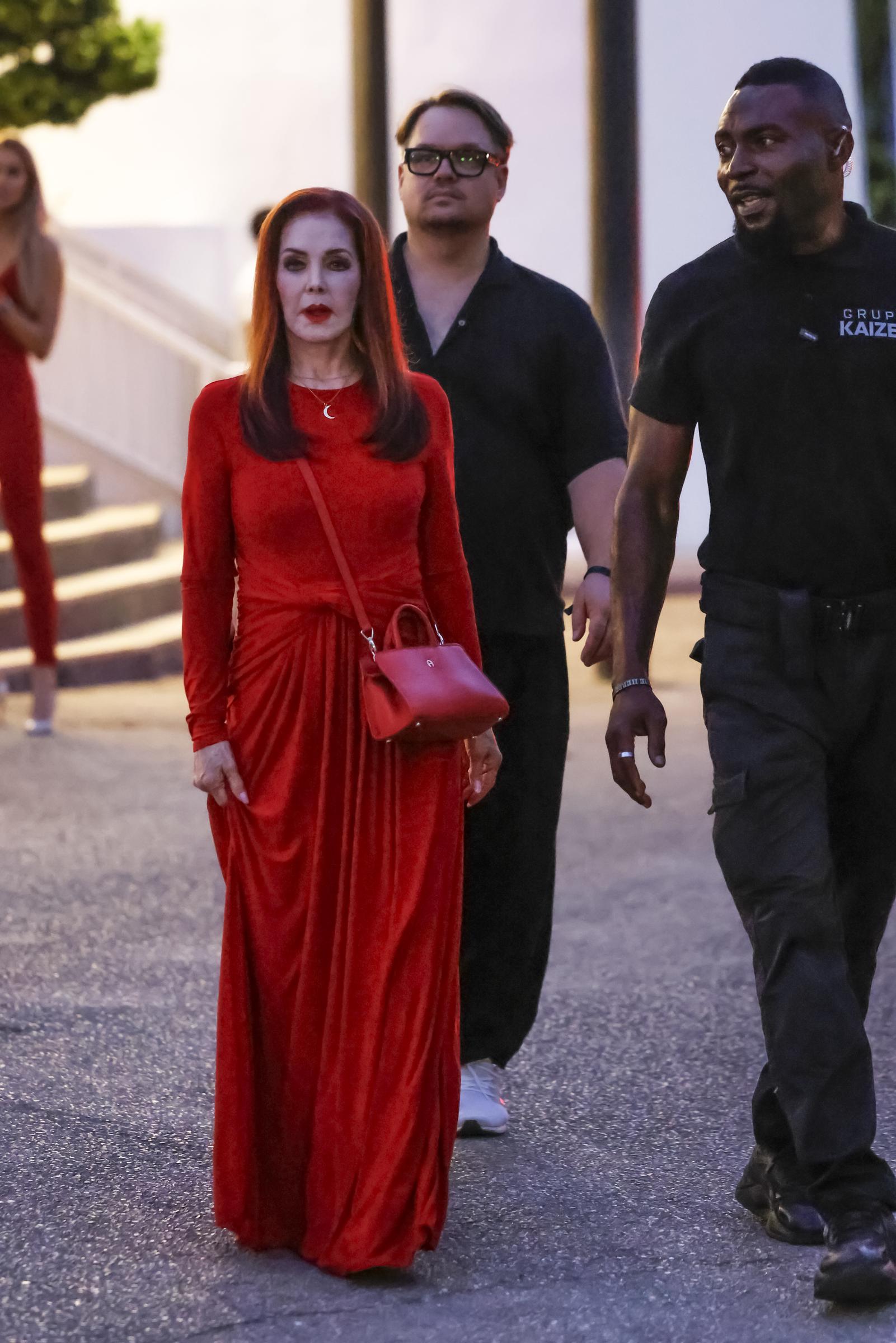 Presley's floor-length gown, crescent moon necklace, and coordinated handbag formed a carefully matched look for the Mallorca gathering. The outing marked a rare public appearance just hours after she shared an emotional message about the difficult experiences that have shaped her life.