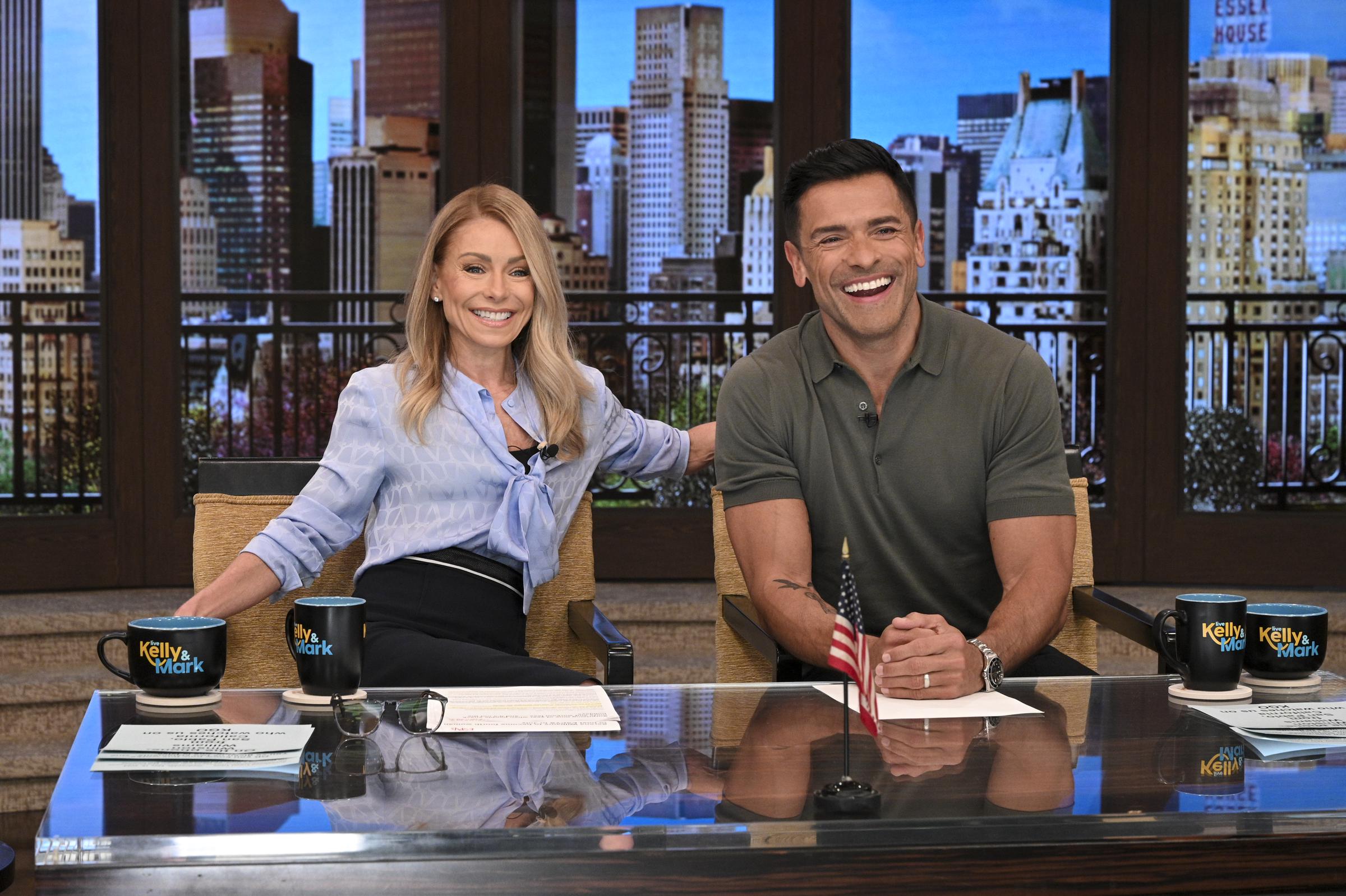 Kelly and Mark photographed during their morning show in May 2024. Their years of working together have brought many private family discussions into the studio, from parenting to marriage. | Source: Getty Images