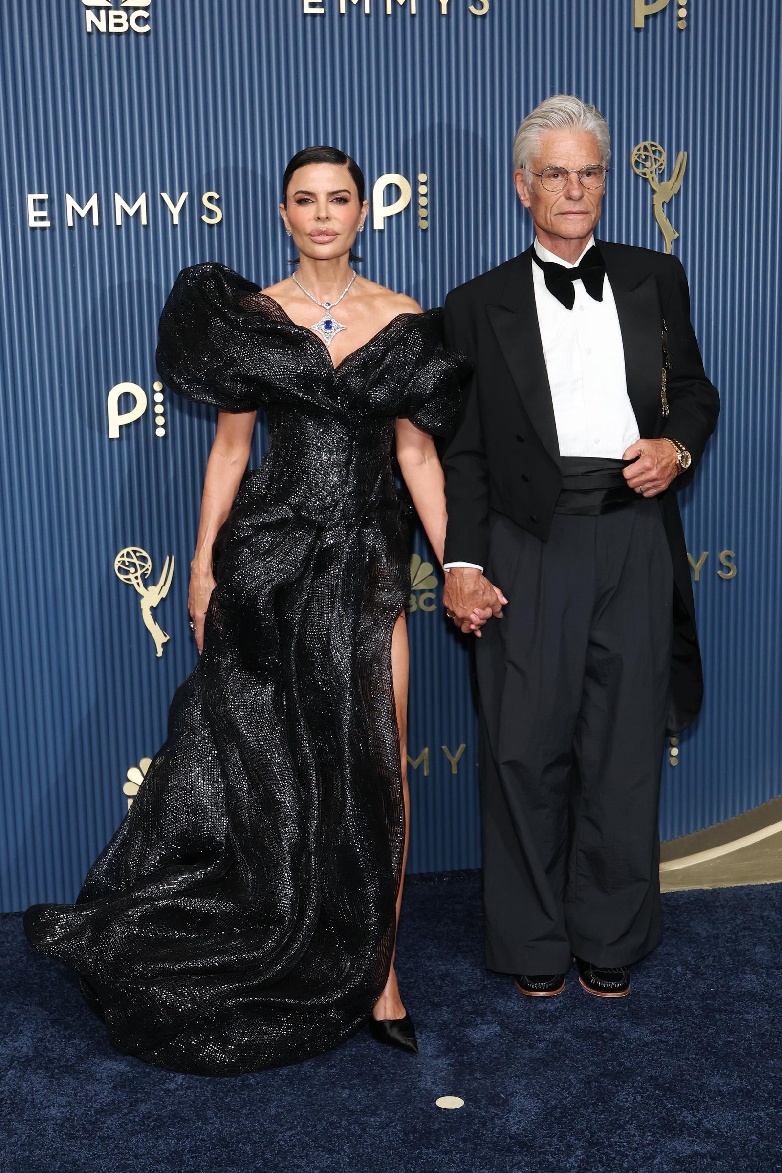 Rinna's dramatic Emmys look drew its own share of commentary, while Hamlin's loose-fitting formalwear kept viewers talking. The divided reactions showed just how quickly one red-carpet moment can become a full-blown fashion debate. | Source: Getty Images