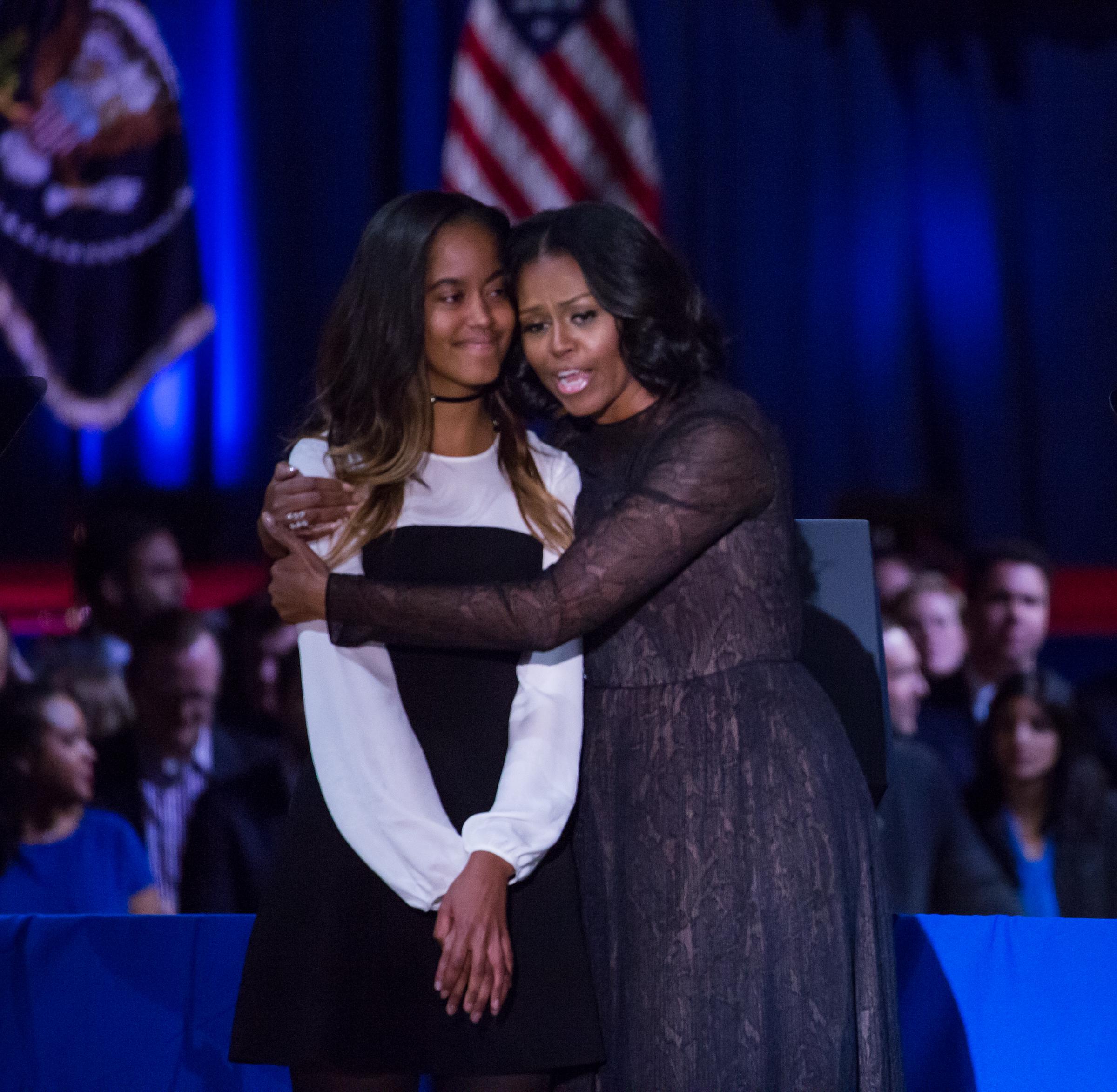 Michelle and Malia Obama at McCormick Place Convention Center on January 10, 2017 | Source: Getty Images