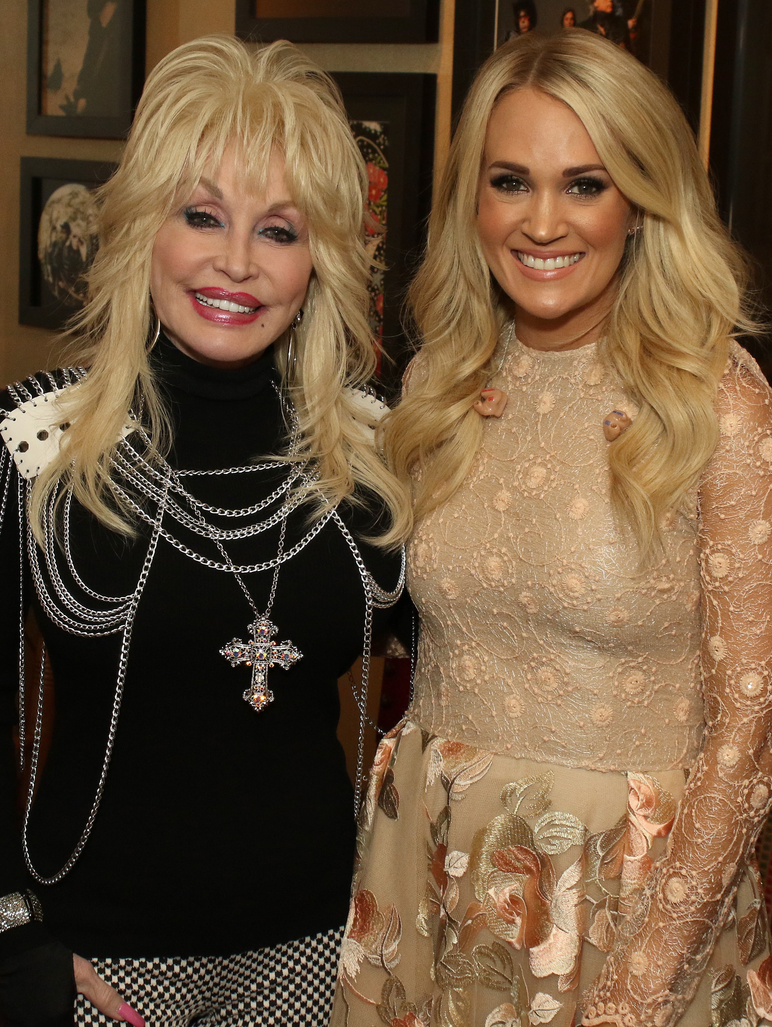 The two country stars cozy up for a sweet backstage snapshot, showcasing their close bond. | Source: Instagram/carrieunderwood