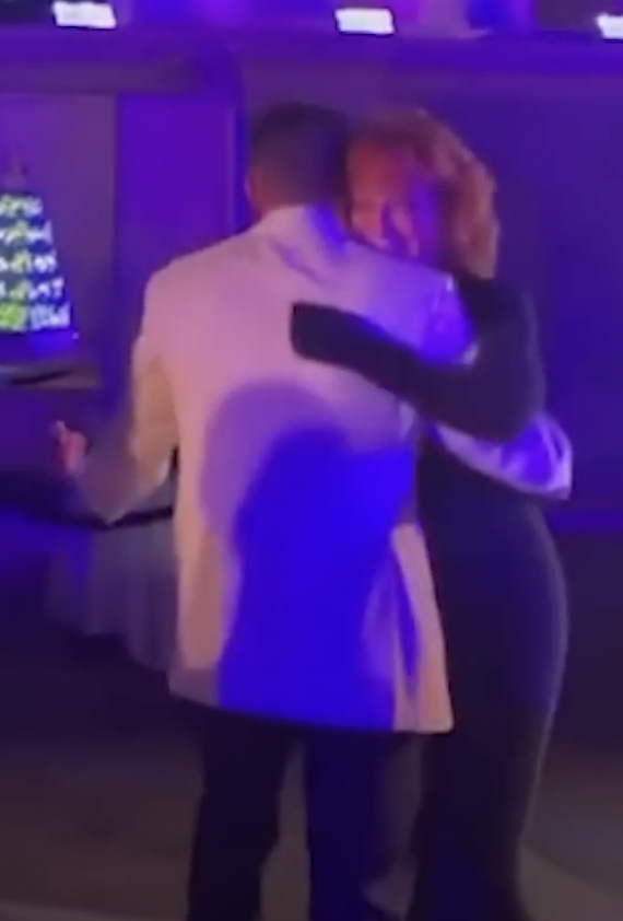 A screenshot of Reba McEntire and Shelby Blackstock during their mother-son dance on his wedding day from a YouTube video dated February 15, 2022. | Source: YouTube/Taste of Country