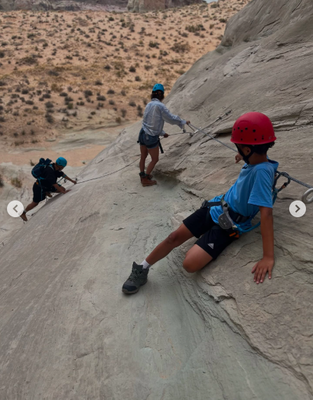 Adventure clearly makes the family album too, with one snapshot showing a child clipped into safety gear while climbing across a rocky surface. It is a reminder that Berry's offscreen life has included plenty of action of its own. | Source: Instagram/halleberry