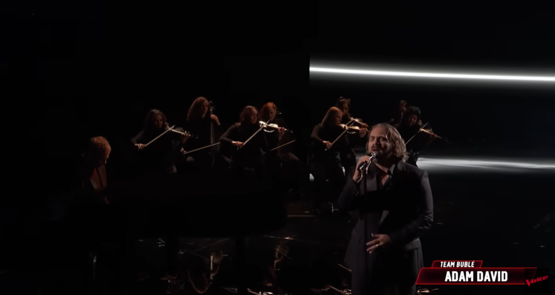 Backed by a live string ensemble, Adam David performs "You Are So Beautiful" during "The Voice" Season 27 finale | Source: YouTube/nbcthevoice