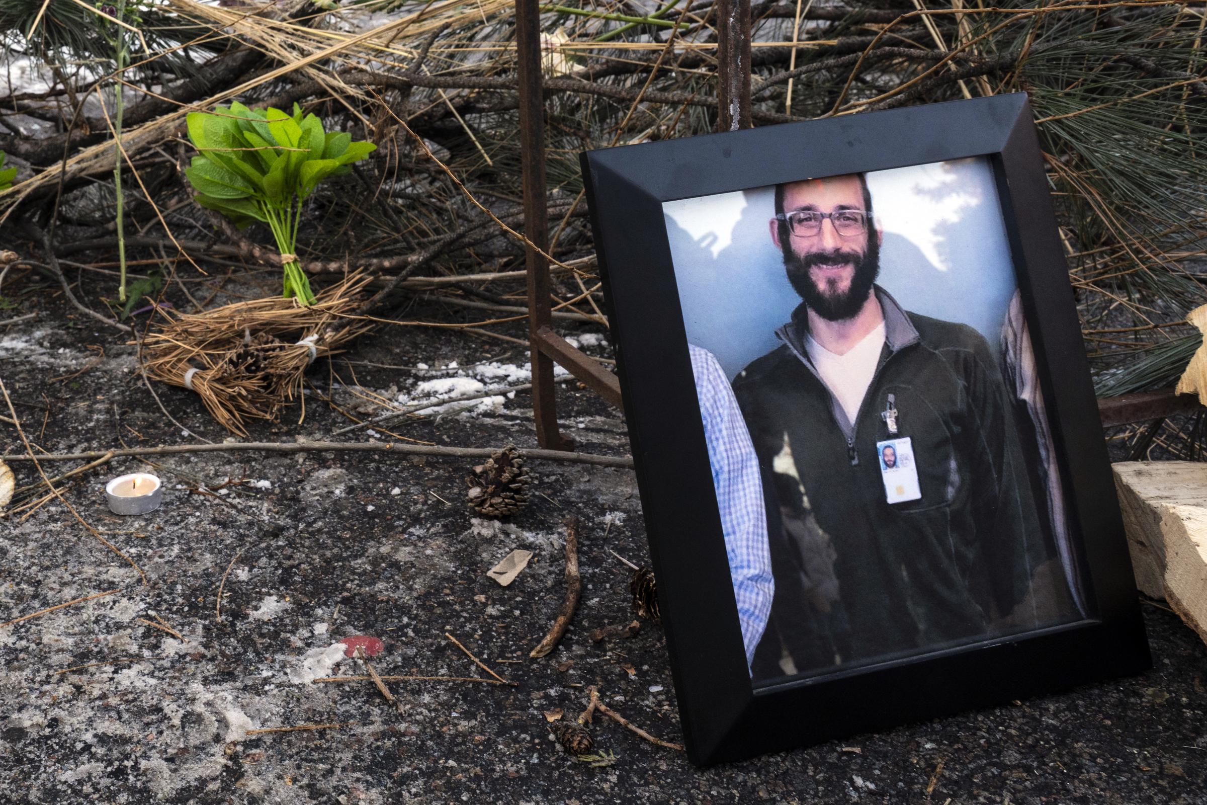 A photo of Alex Pretti can be seen at a makeshift memorial in the area where he was shot dead in Minneapolis, Minnesota, on January 24, 2026. | Source: Getty Images