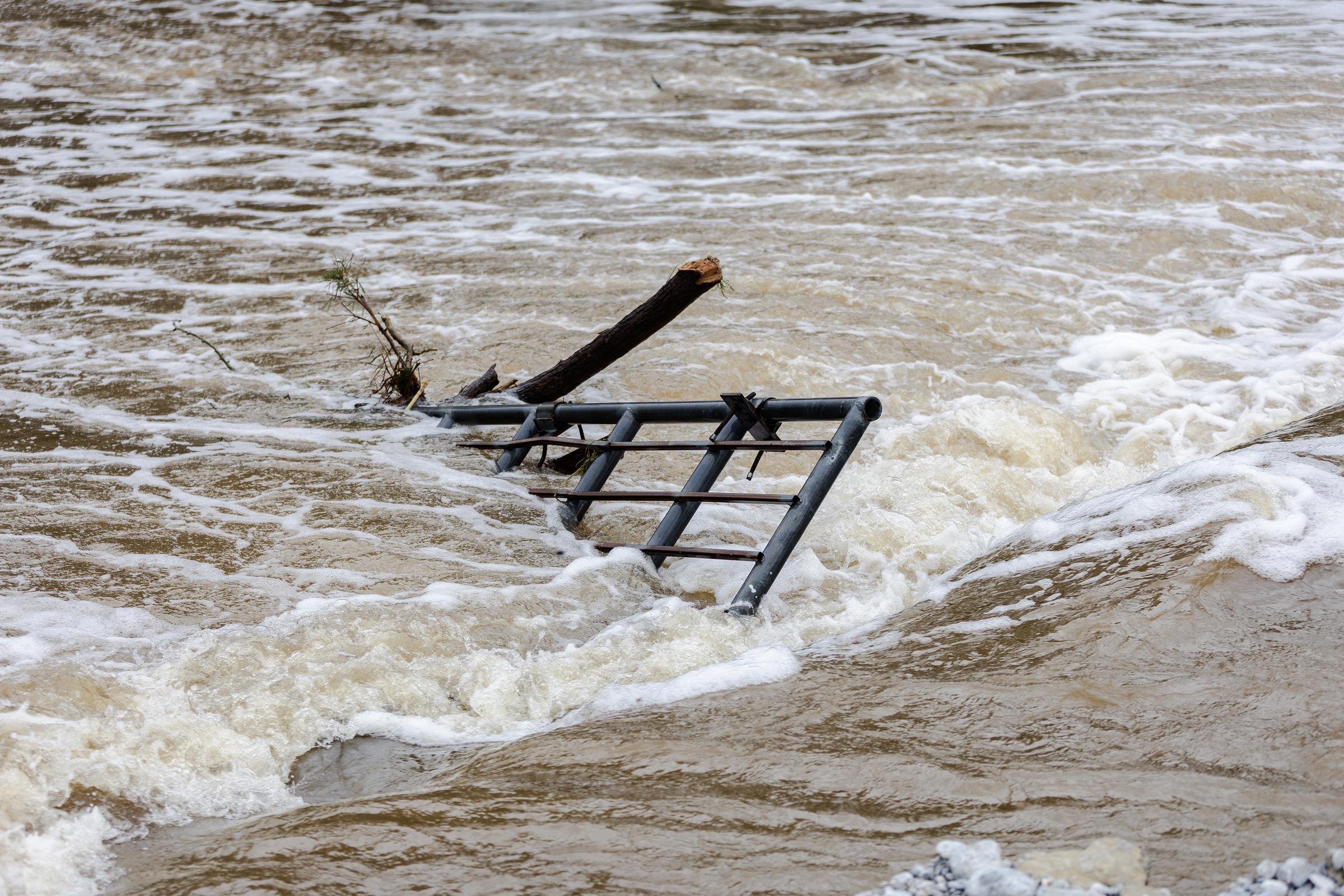 Debris sits in the Guadalupe River after flash flooding damaged nearby buildings in Center Point, Texas on July 5, 2025. | Source: Getty Images