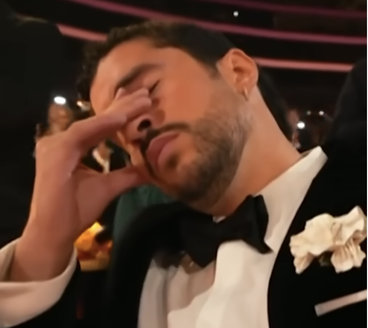 Bad Bunny reacts to winning Album of the Year for "DeBÍ TiRAR MáS FOToS" during the 68th Annual Grammy Awards at Crypto.com Arena on February 1, 2026, in Los Angeles | Source: YouTube/enews