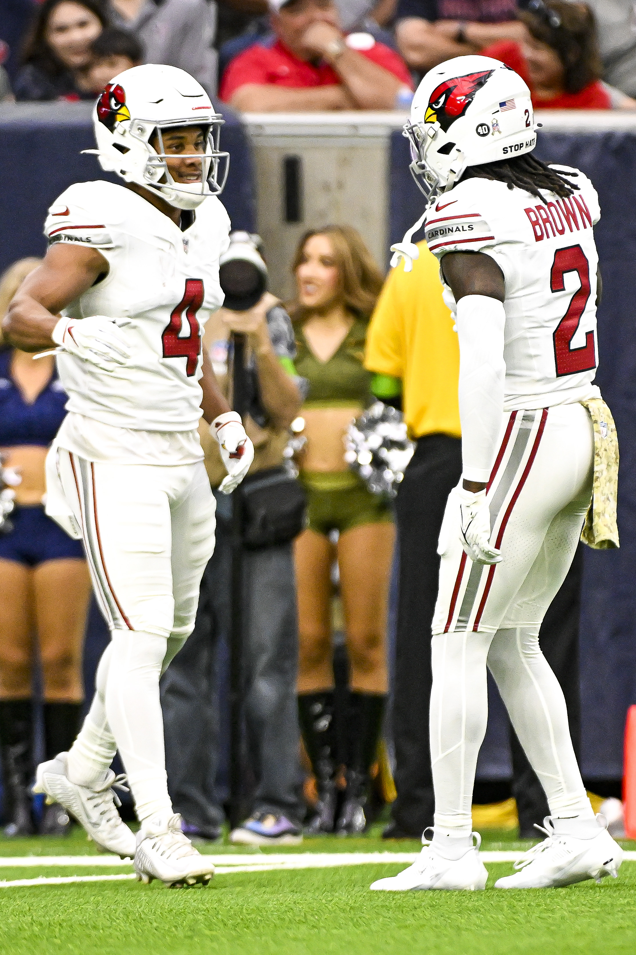 Rondale Moore and Marquise Brown of the Arizona Cardinals celebrate after scoring a touchdown against the Houston Texans at NRG Stadium on November 19, 2023, in Houston, Texas | Source: Getty Images