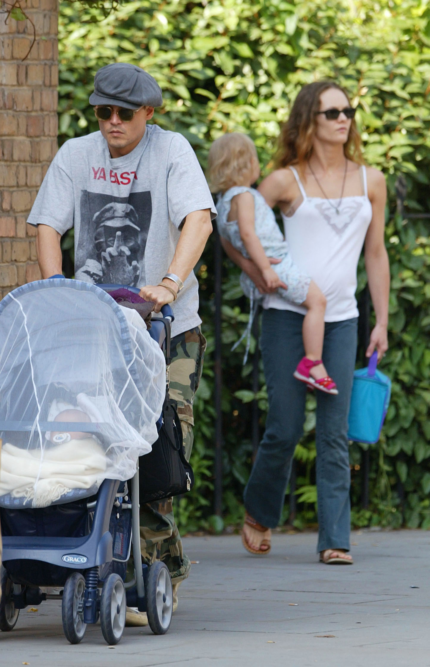 Johnny Depp and Vanessa Paradis take their two children, Lily-Rose and Jack, on a family outing in a London park. The photograph offers a glimpse of Depp's childhood, which she later discussed while explaining how her parents protected their children from public attention. | Source: Getty Images
