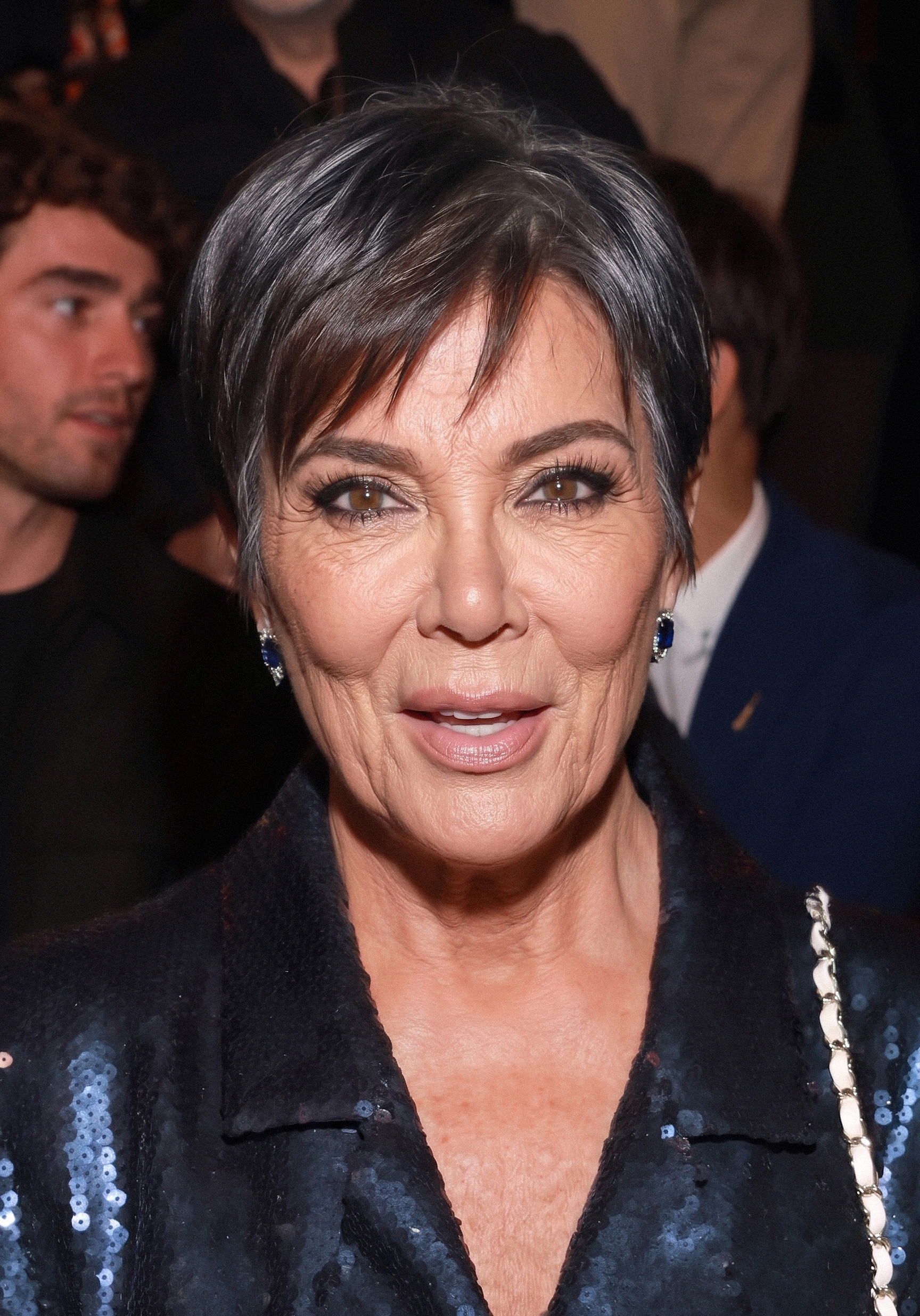 With silver strands running through her short hairstyle, this imagined Kris offers a closer look at the facial lines and natural texture that cosmetic procedures can soften. | Source: Gemini