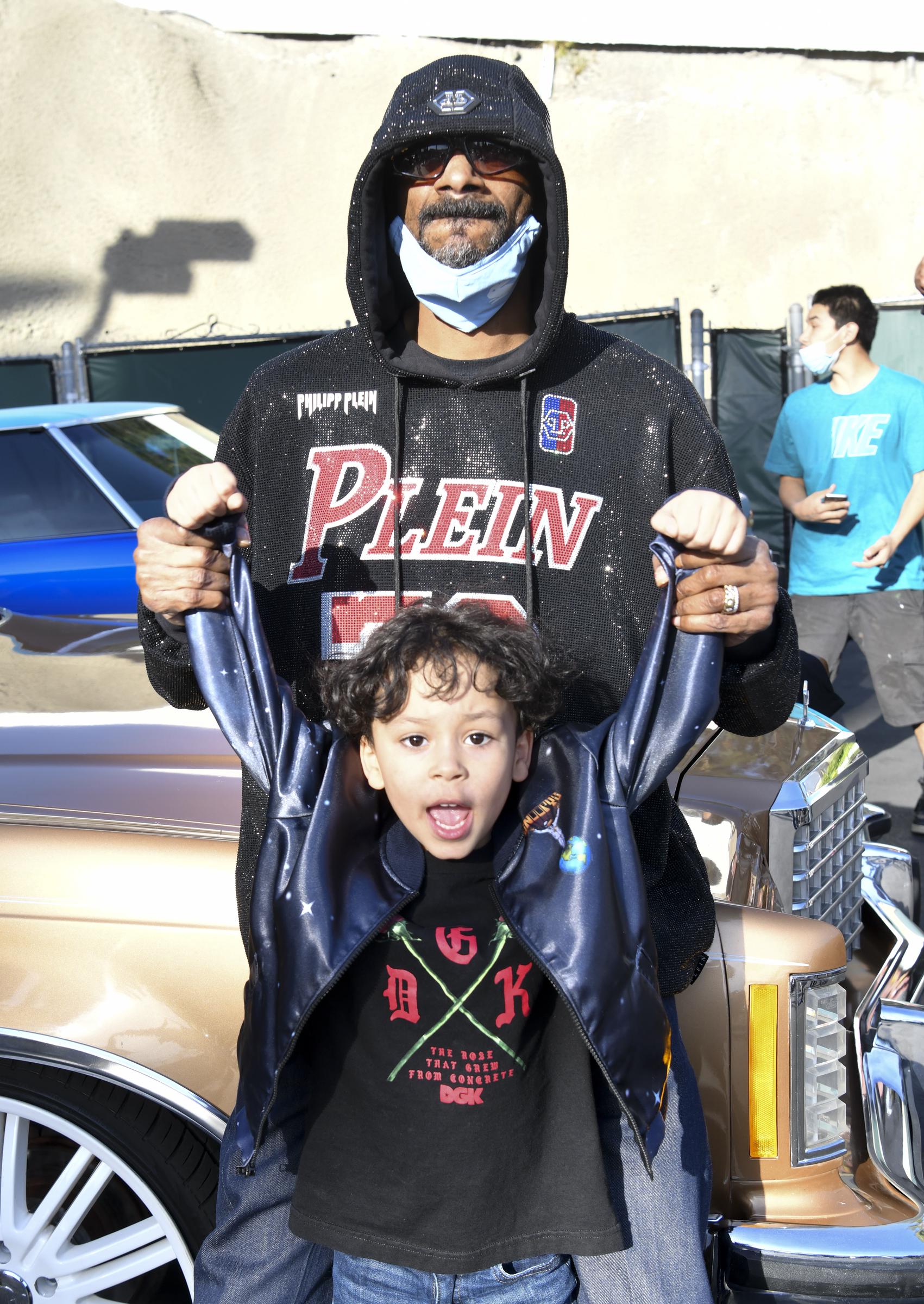 Snoop Dogg and grandson, Zion Broadus in 2021 | Source: Getty Images