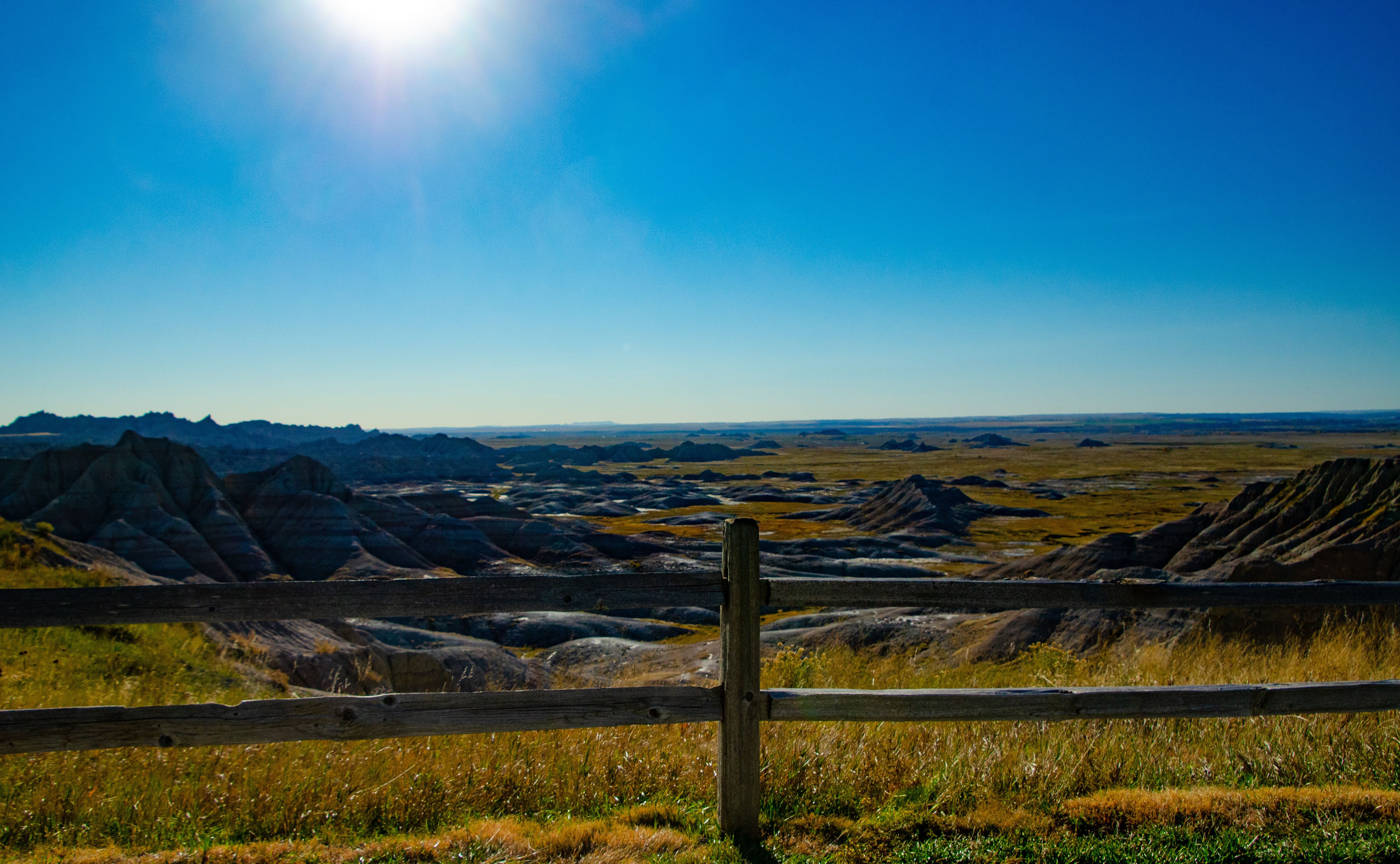Sun shines over the rugged landscape of Badlands National Park in Wall, South Dakota, on October 21, 2023 | Source: Getty Images