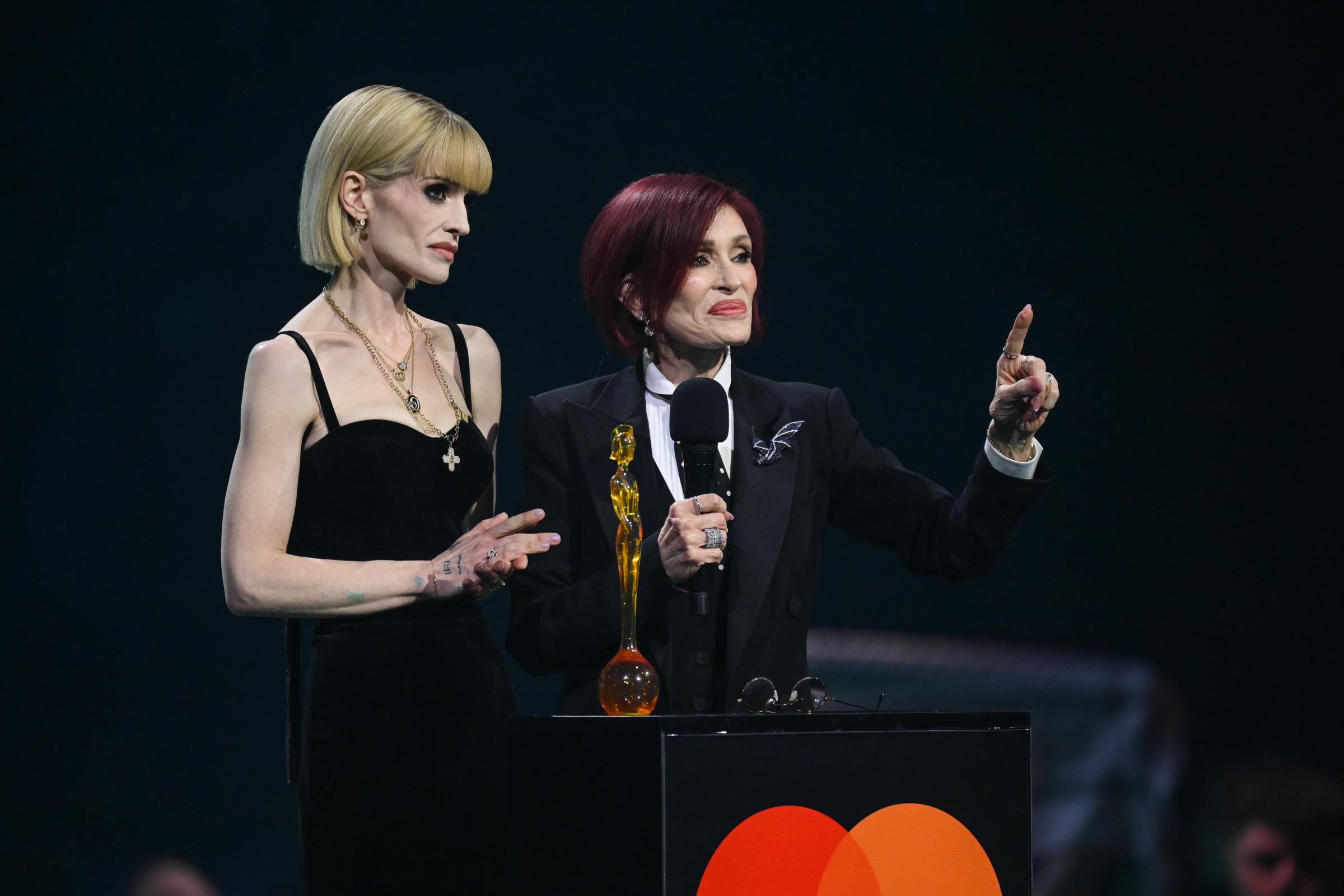 Sharon and Kelly Osbourne continued honoring Ozzy's legacy together after his death. On the first anniversary of his passing, Kelly reflected on the lasting impact of losing her father and the memories she continues to cherish. | Source: Getty Images