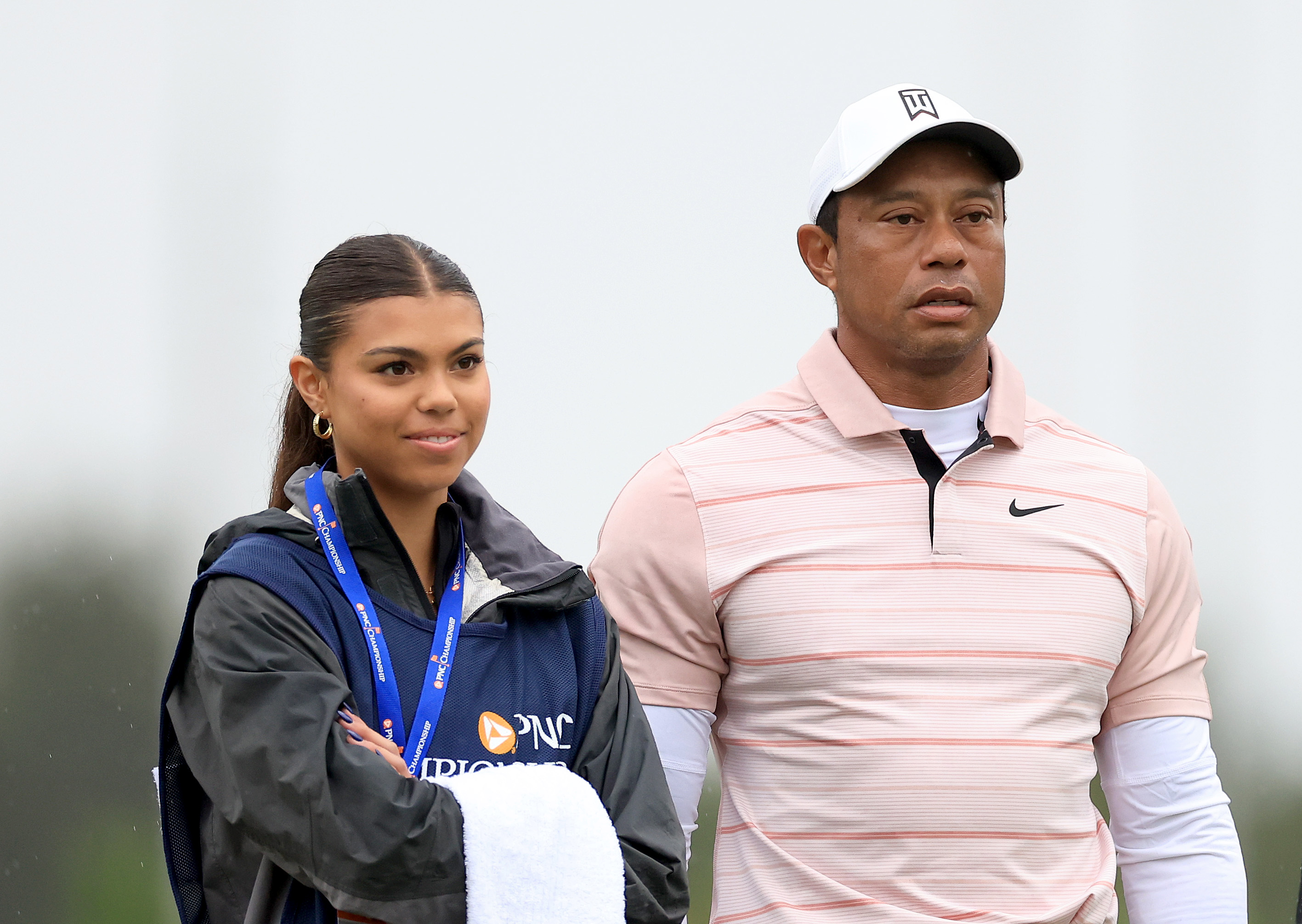 Tiger Woods and Sam Woods wait to putt on the third hole during the first round of the PNC Championship at The Ritz-Carlton Golf Club on December 16, 2023, in Orlando, Florida | Source: Getty Images
