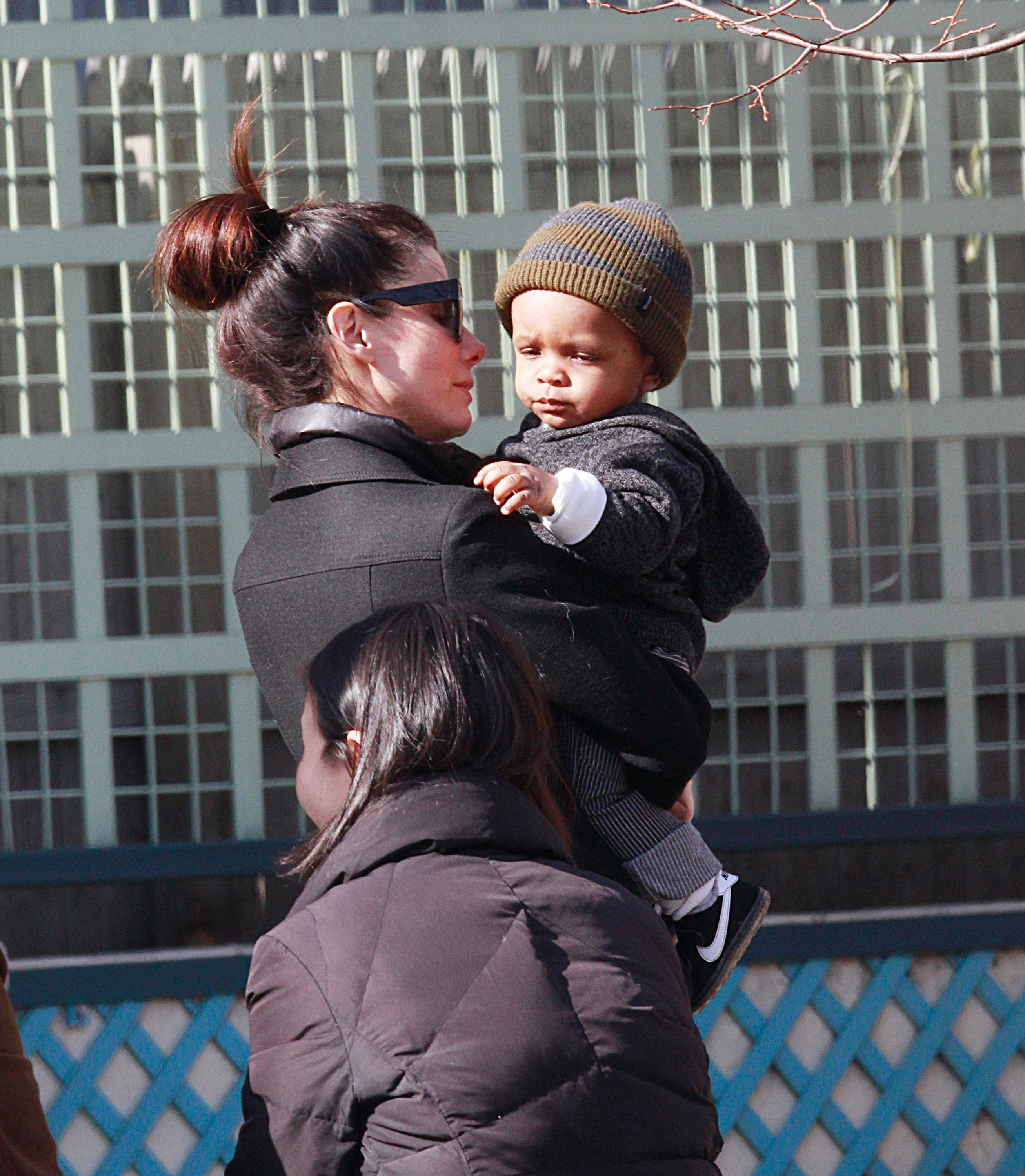 Sandra Bullock openly gushed about her bond with Louis shortly after his adoption became public knowledge. During this outing, she and her son walked the streets of Manhattan on March 20, 2011, in New York City, New York. | Source: Getty Images