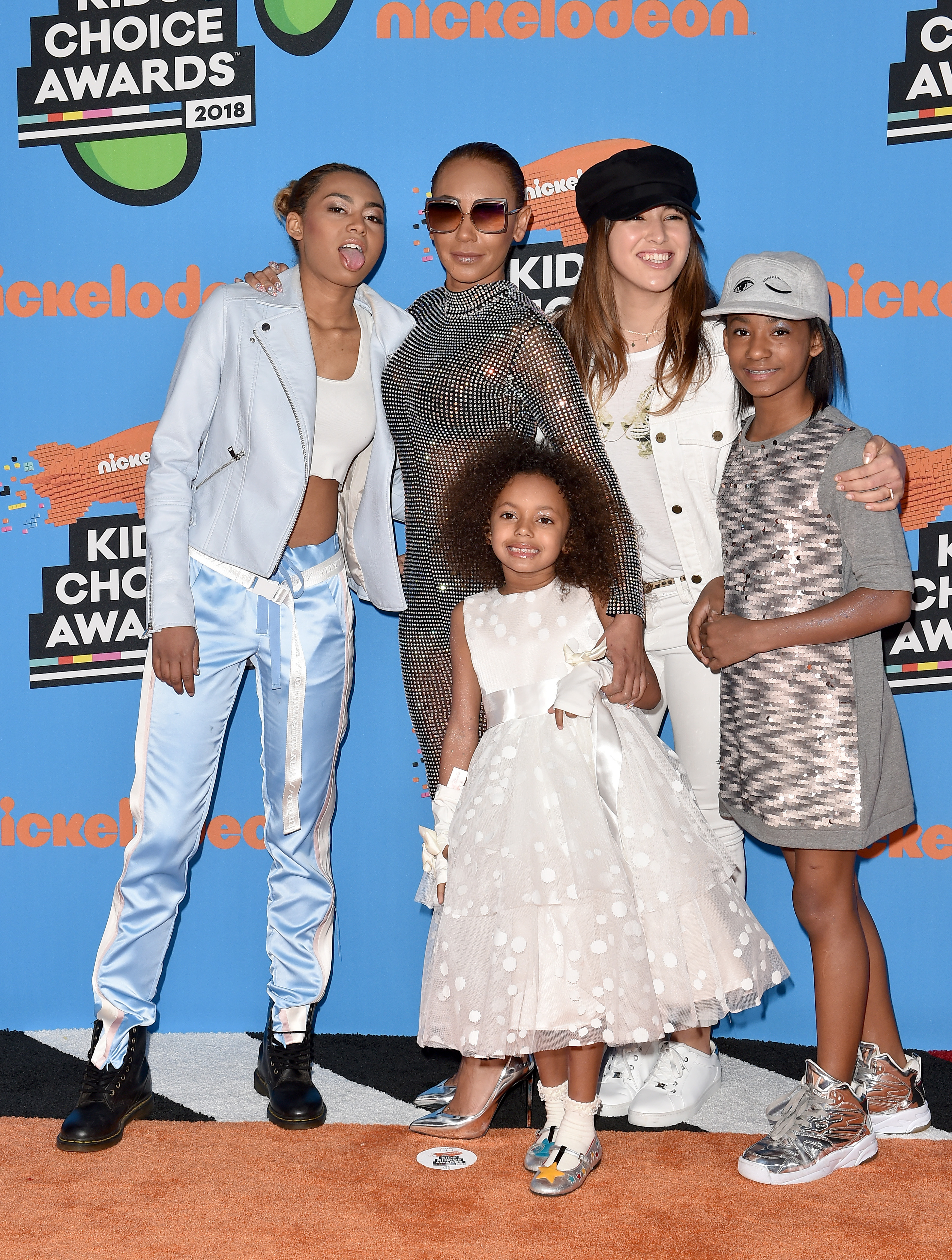 Phoenix Chi Gulzar, Mel B, Madison Brown, Giselle Belafonte, and Angel Iris Murphy Brown attend Nickelodeon's Kids' Choice Awards on March 24, 2018 | Source: Getty Images