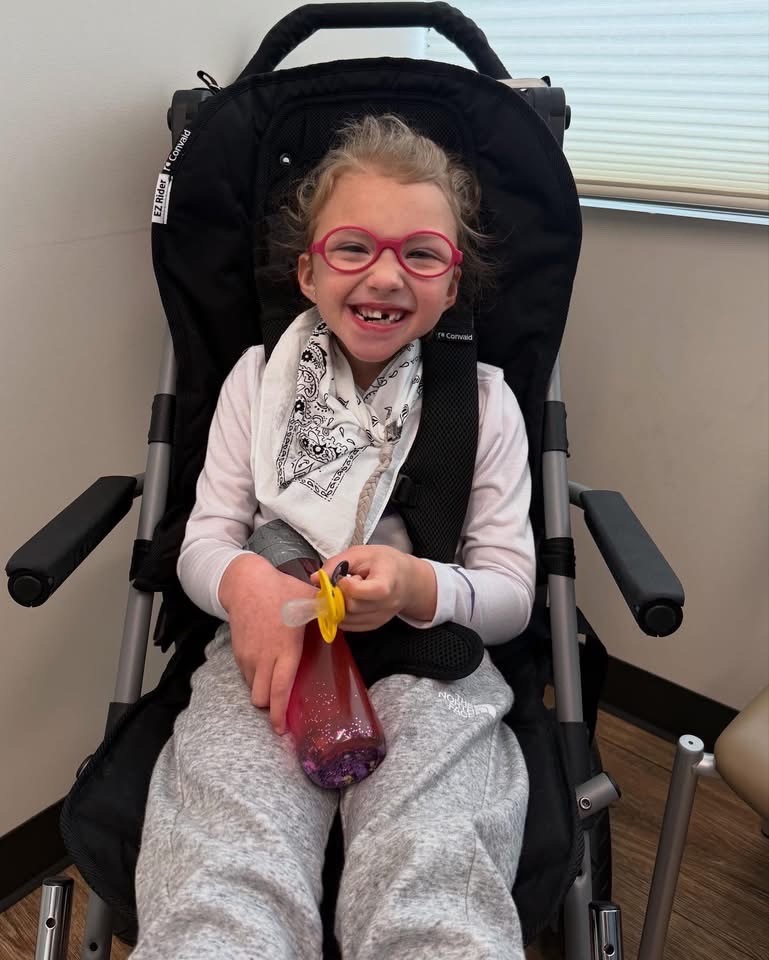 Saylor Graham, 7, flashes a big smile behind her bright pink glasses. Her family describes her as a determined little girl who had already faced significant medical challenges before the shooting. | Source: GoFundMe