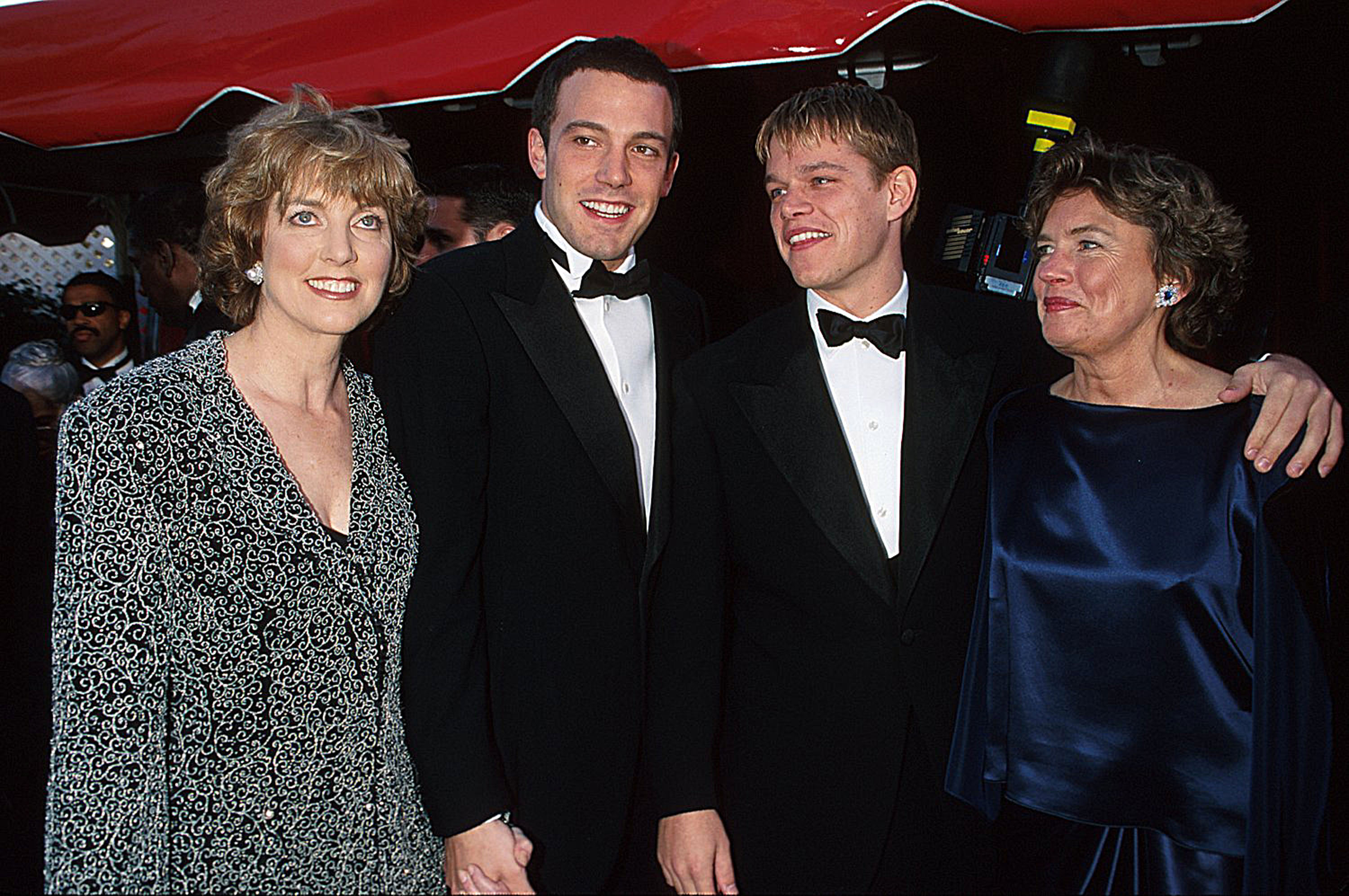 Chris accompanied Ben to the 1998 Academy Awards, where he and Matt Damon won Best Original Screenplay for "Good Will Hunting." Ben later recalled that both men instinctively embraced their mothers when their names were announced. | Source: Getty Images